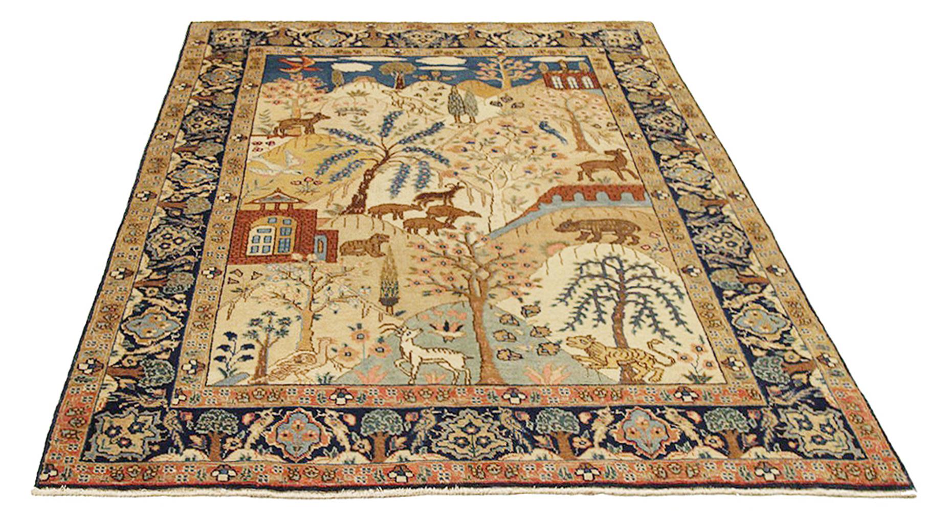 Antique Persian rug handwoven from the finest sheep’s wool and colored with all-natural vegetable dyes that are safe for humans and pets. It’s a traditional Tabriz weaving featuring a stunning ensemble of animal designs and colorful landscape