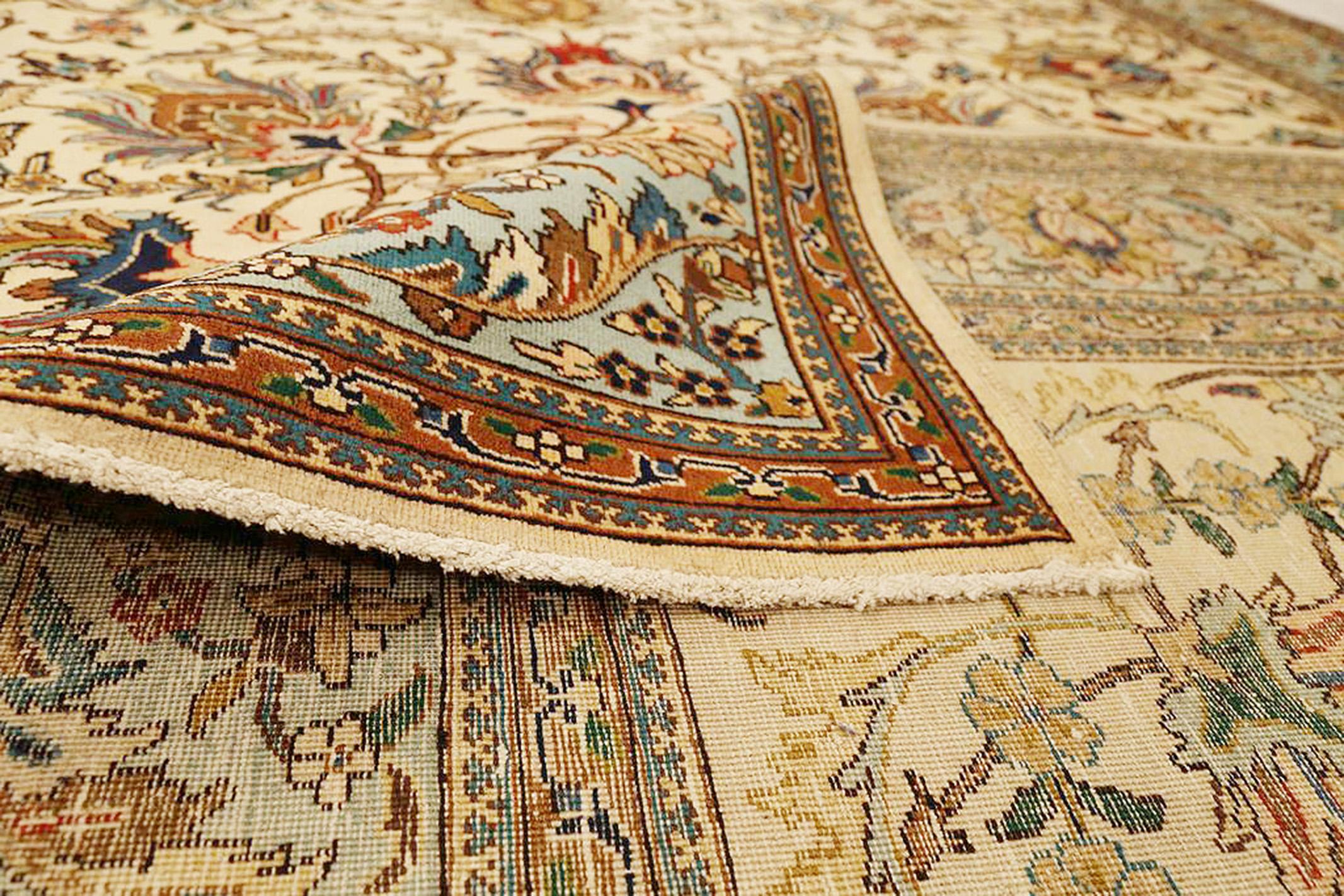 Antique Persian Tabriz Rug with Colorful Flower Motifs on Ivory Field In Excellent Condition For Sale In Dallas, TX
