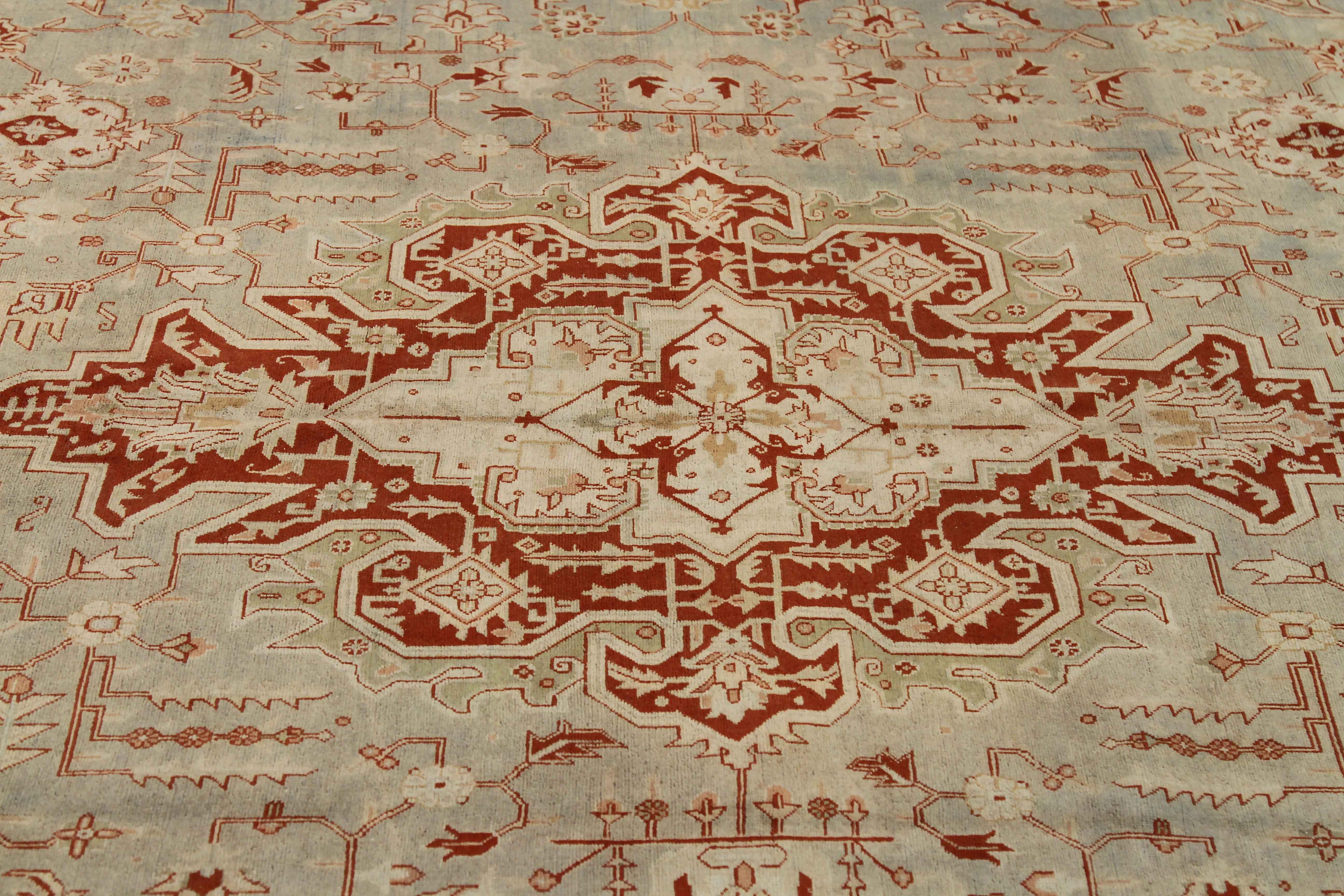 Hand-Woven Antique Persian Tabriz Rug with Floral Details on Red/Beige Field For Sale