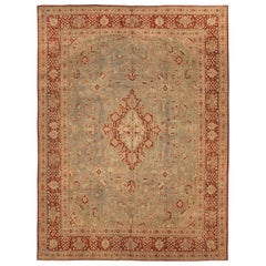 Antique Persian Tabriz Rug with Floral Details on Red/Beige Field