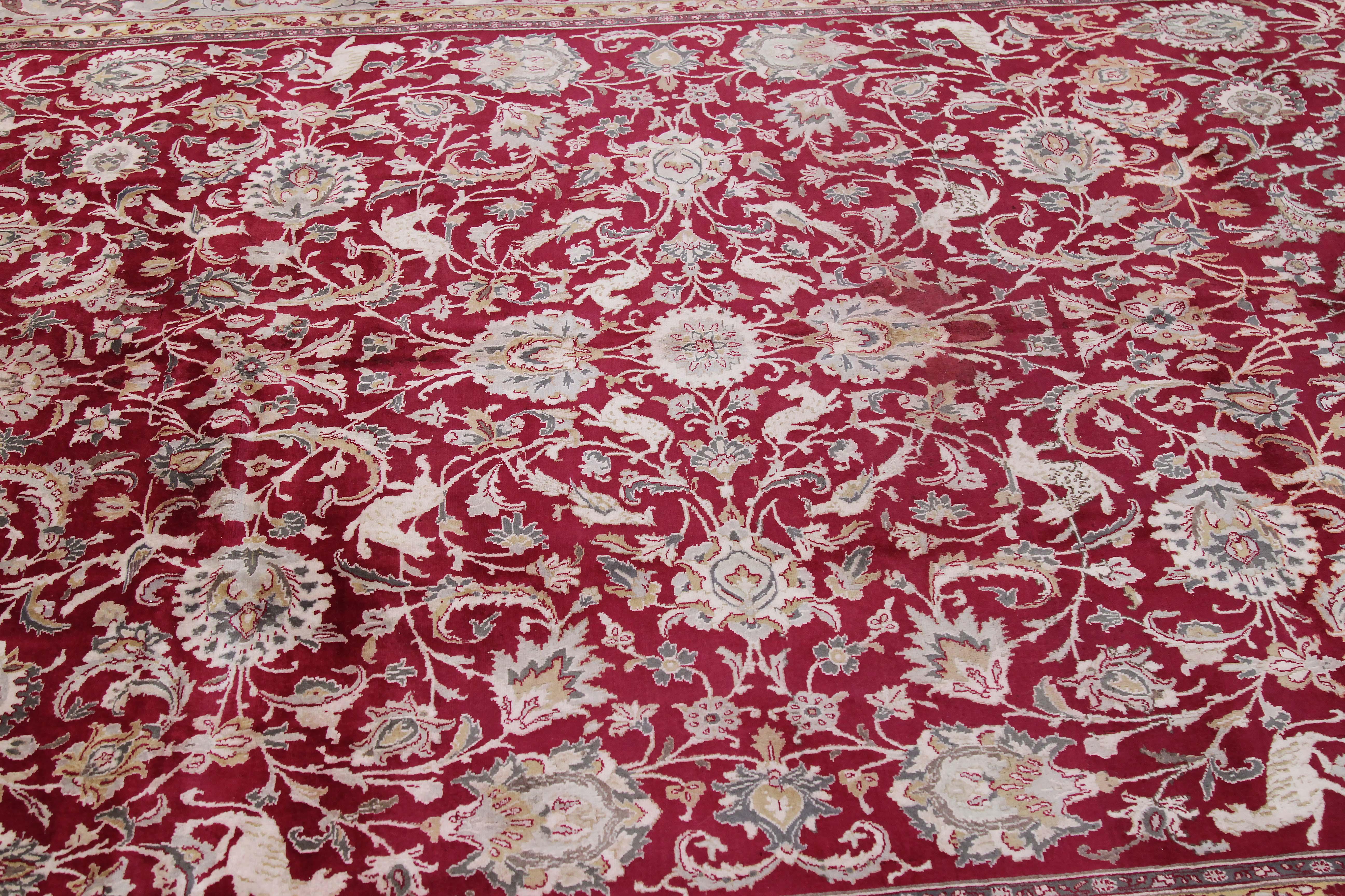 Hand-Woven Antique Persian Tabriz Rug with Floral Details on Red Field For Sale