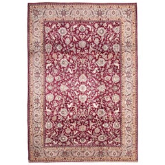 Antiker persischer Täbriz-Teppich mit floralen Details auf rotem Feld