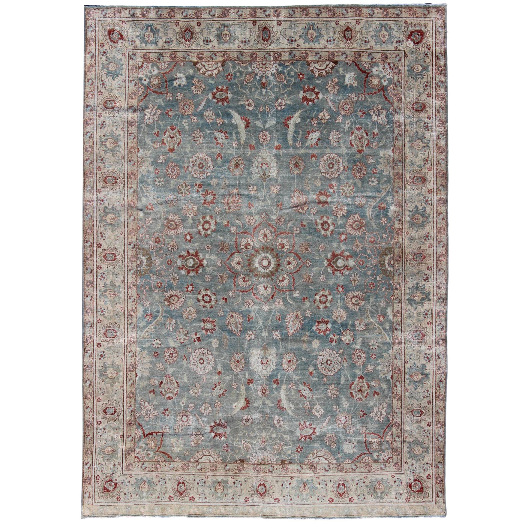 Antique Persian Tabriz Rug with Floral Medallion Design in Red and Blue