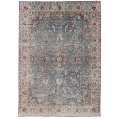 Antiker persischer Täbriz-Teppich mit floralem Medaillon-Muster in Rot und Blau