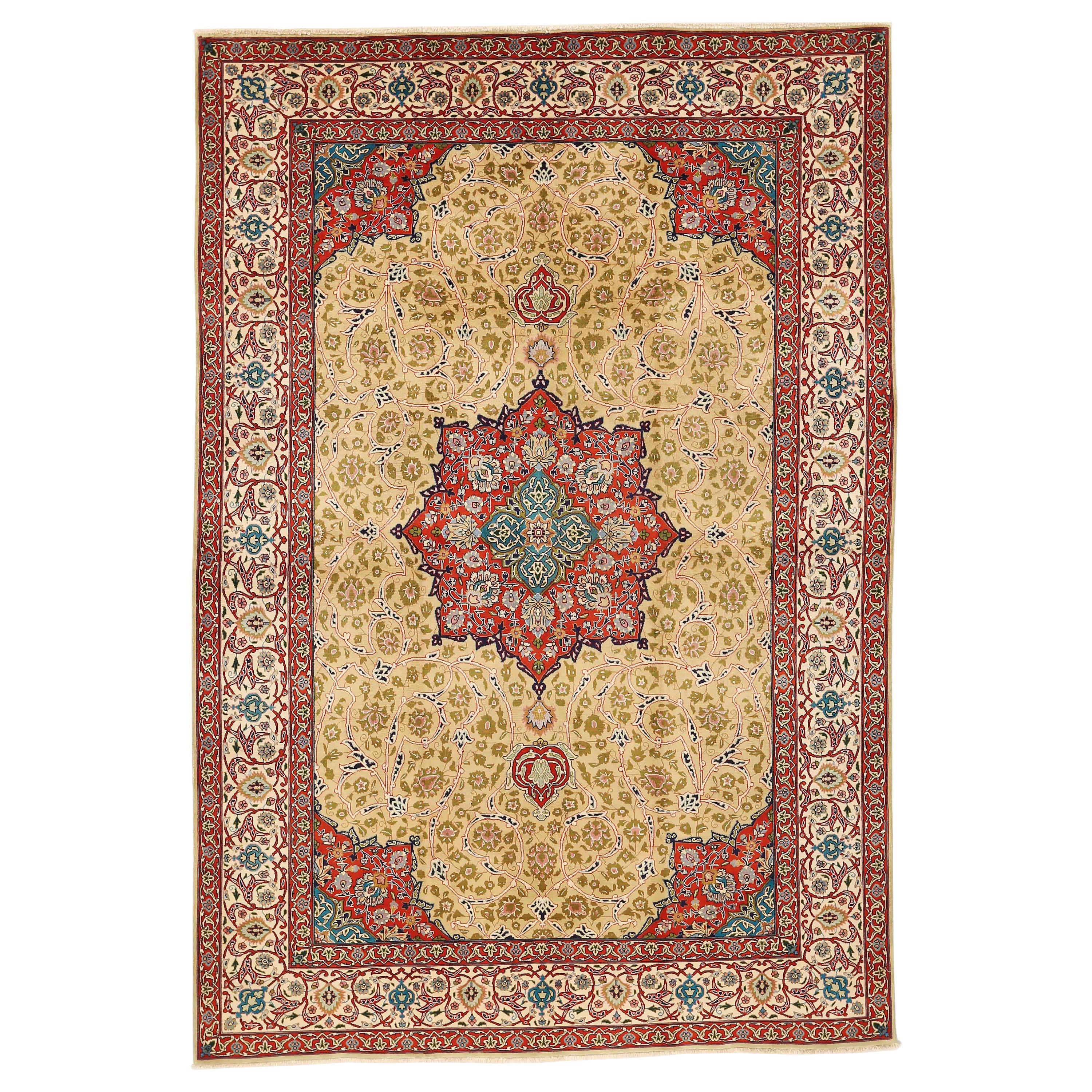 Antique Persian Tabriz Rug with Green and Pink Floral Details on Center Field For Sale