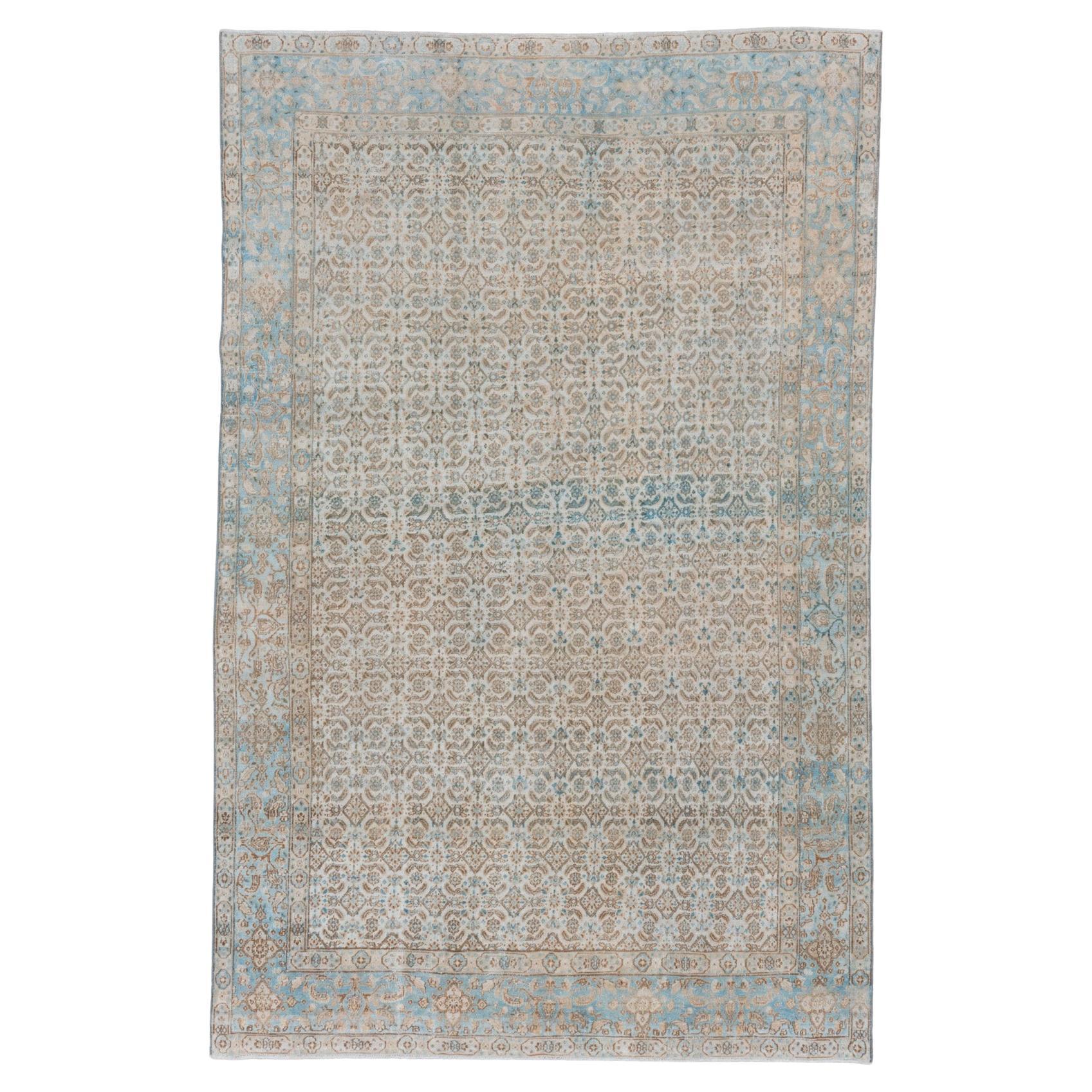 Antique Persian Tabriz Rug with Intricate Floral Design