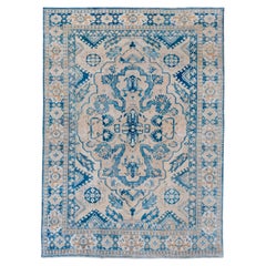 Antique Persian Tabriz Rug with Intricate Floral Design