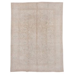 Antique Persian Tabriz Rug with Large Floral Medallion