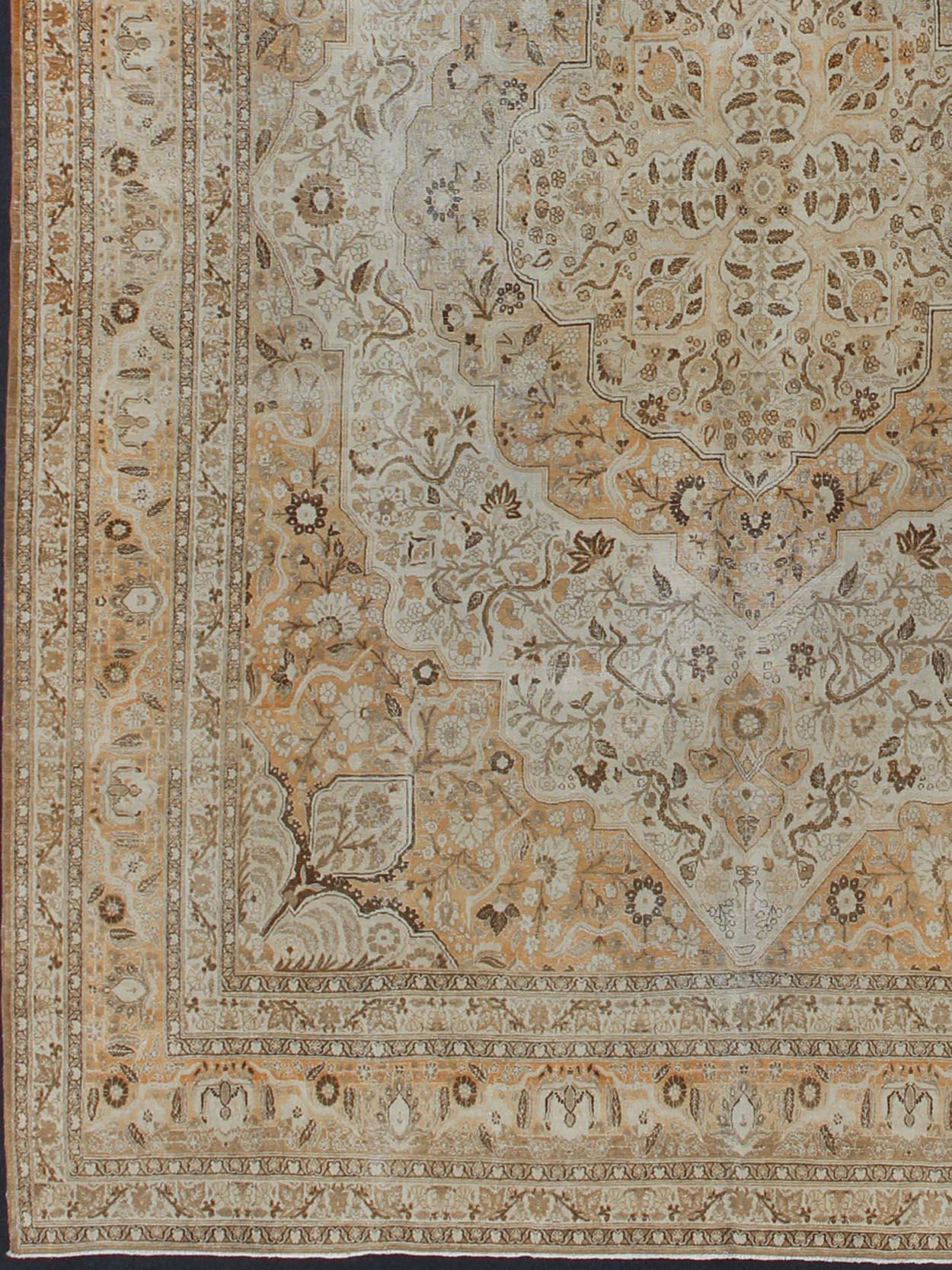 Antique Persian Tabriz Haji Jalili type rug with layered medallion in coral, gray, peach, taupe, cream. Keivan Woven Arts / EMA-7510, country of origin / type: Iran / Tabriz, circa 1900
Measures: 11' x 16'8.  
This light colored antique Persian