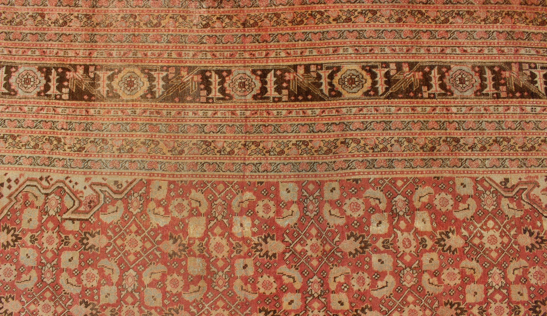 Wool Antique Persian Tabriz Rug with Medallion Design in Coral, Cream and Brown Tones For Sale