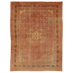 Tapis persan antique Tabriz avec am designs de médaillons dans les tons corail, crème et Brown