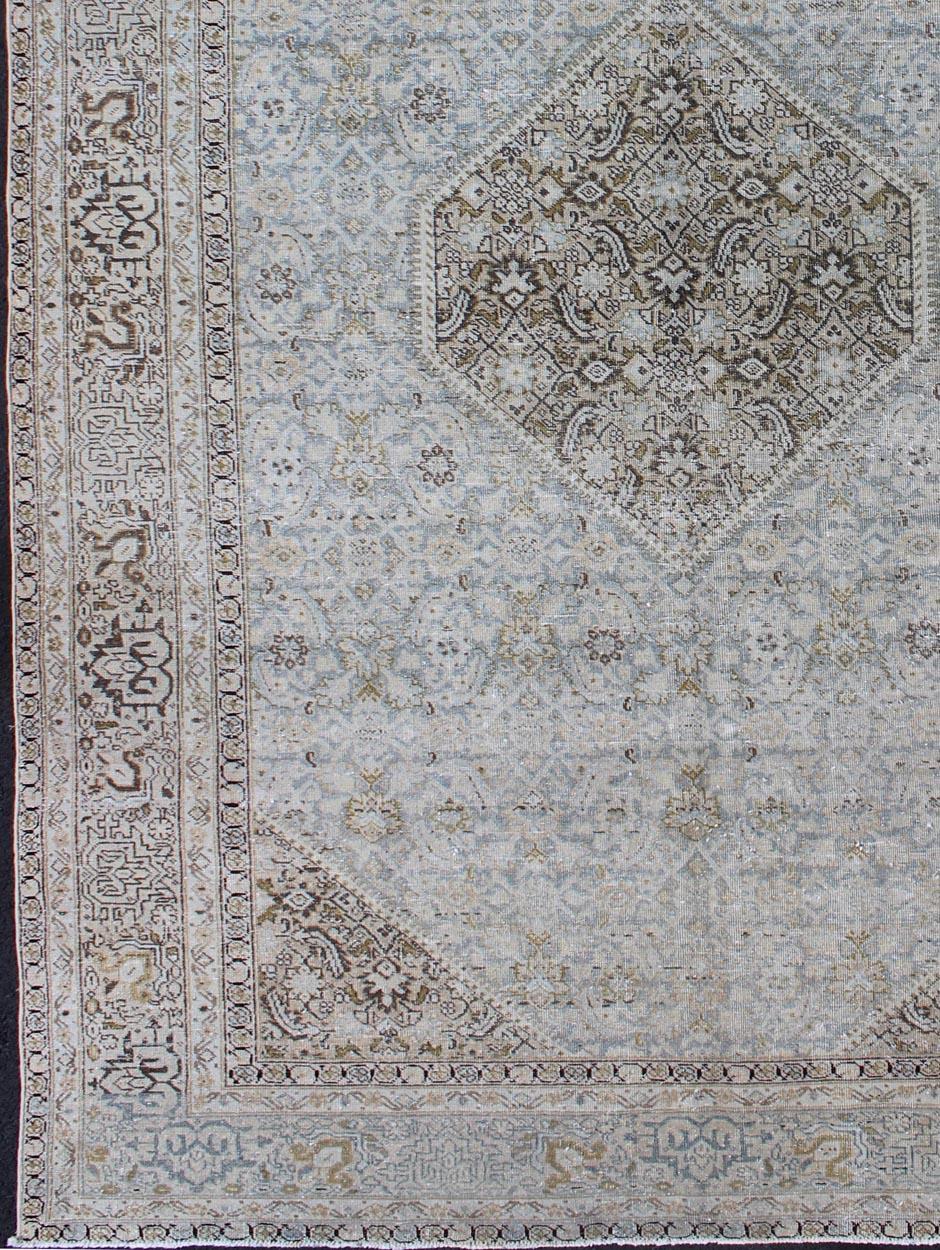 Antique Persian Tabriz rug with medallion in light blue, tan and brown colors, rug na-170935, country of origin / type: Iran / Tabriz, circa 1920

This spectacular Persian Tabriz bears a magnificent splendor indicative of royal tastes, which