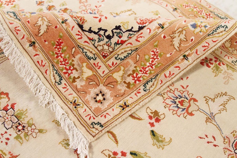 Antique Persian Tabriz Rug with Red and Brown Floral Details on Ivory