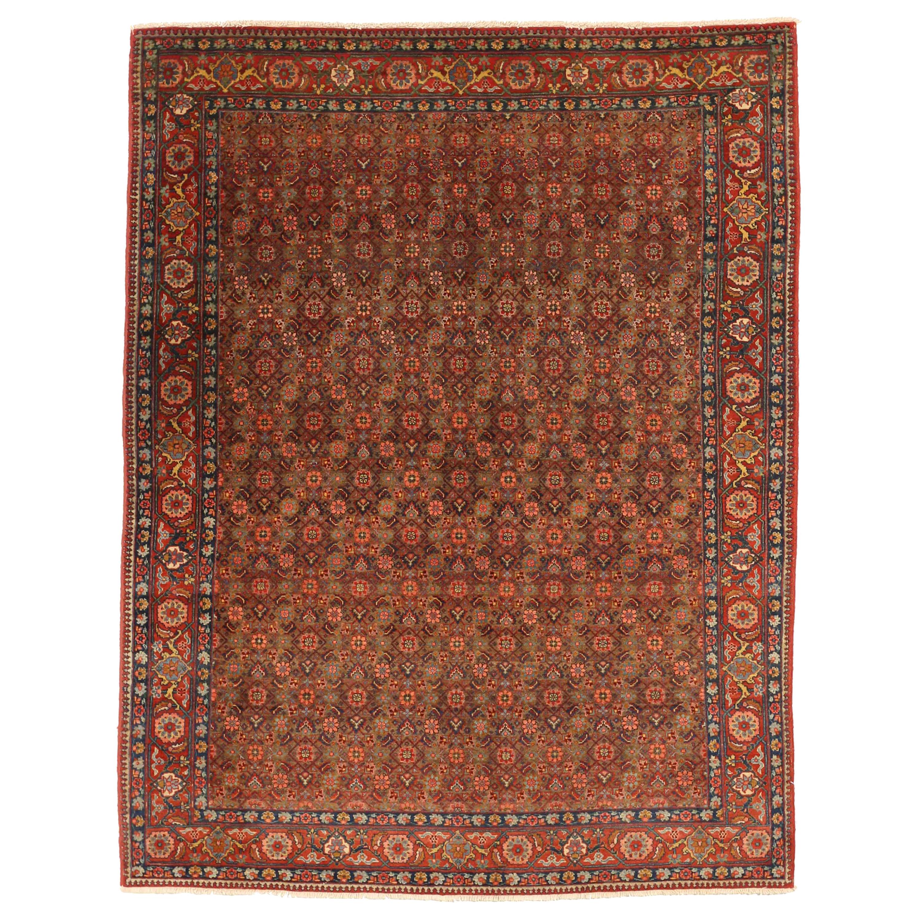 Antiker persischer Täbriz-Teppich mit roten und grünen Blumenmotiven
