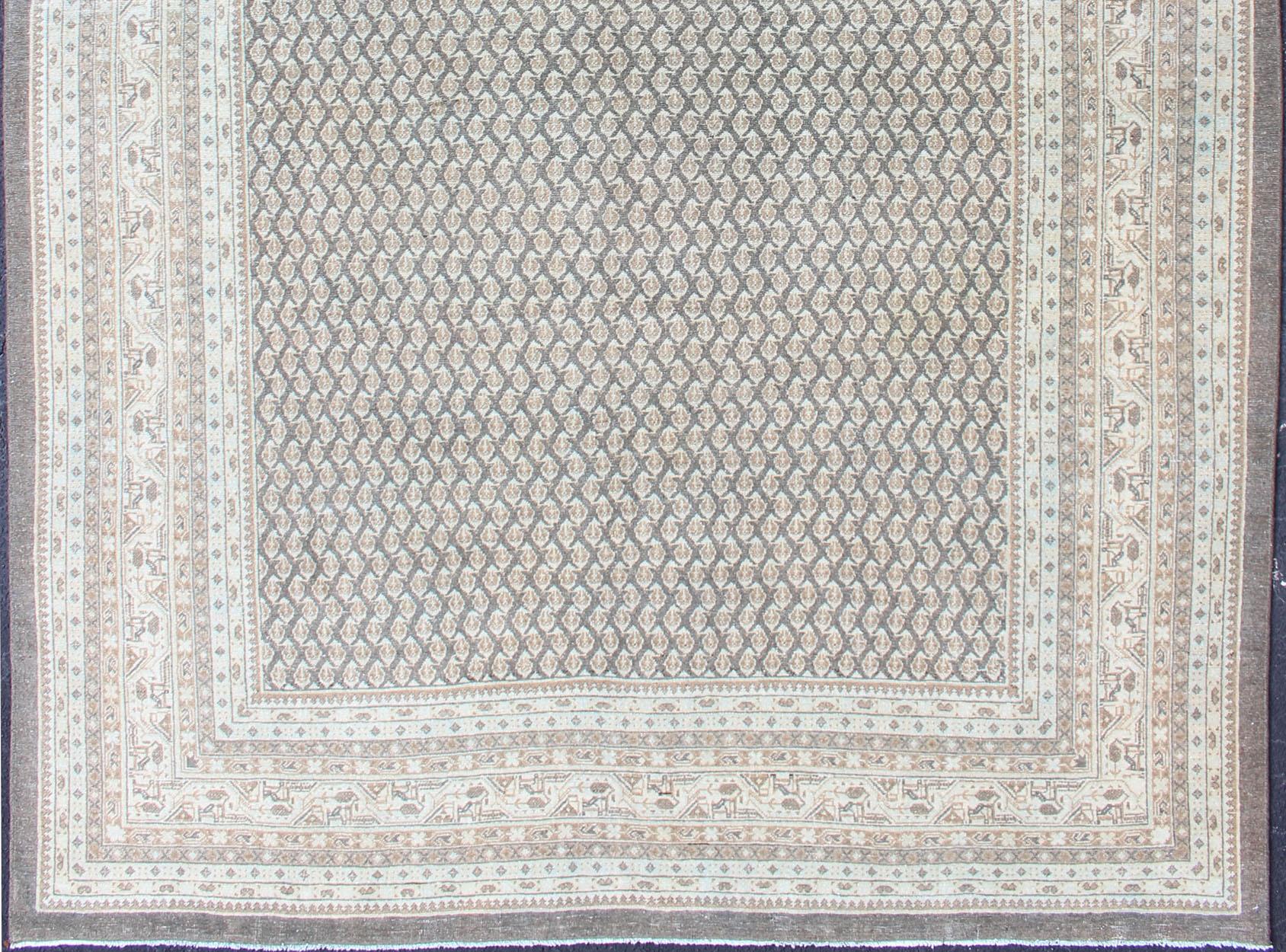 Gray background Tabriz Antique rug from Persia with Repeating Geometric design, rug SUS-2009-822, country of origin / type: Iran / Tabriz, circa 1940

This antique Persian Tabriz carpet (circa mid20th century) features a refined palate of gray,