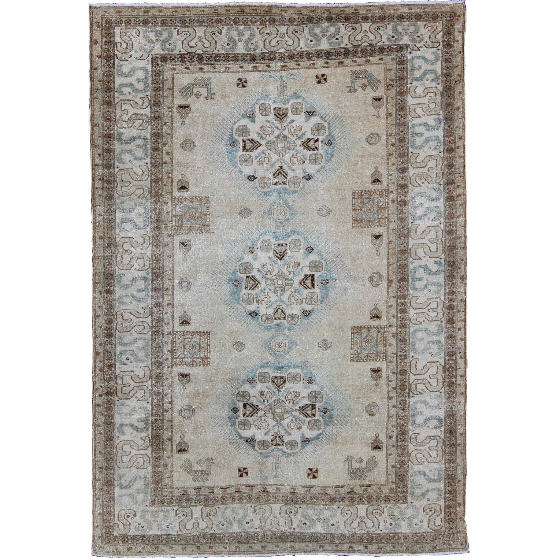 Antique Persian Tabriz Rug with Three Medallions in Muted Earth Tones and L.Blue For Sale