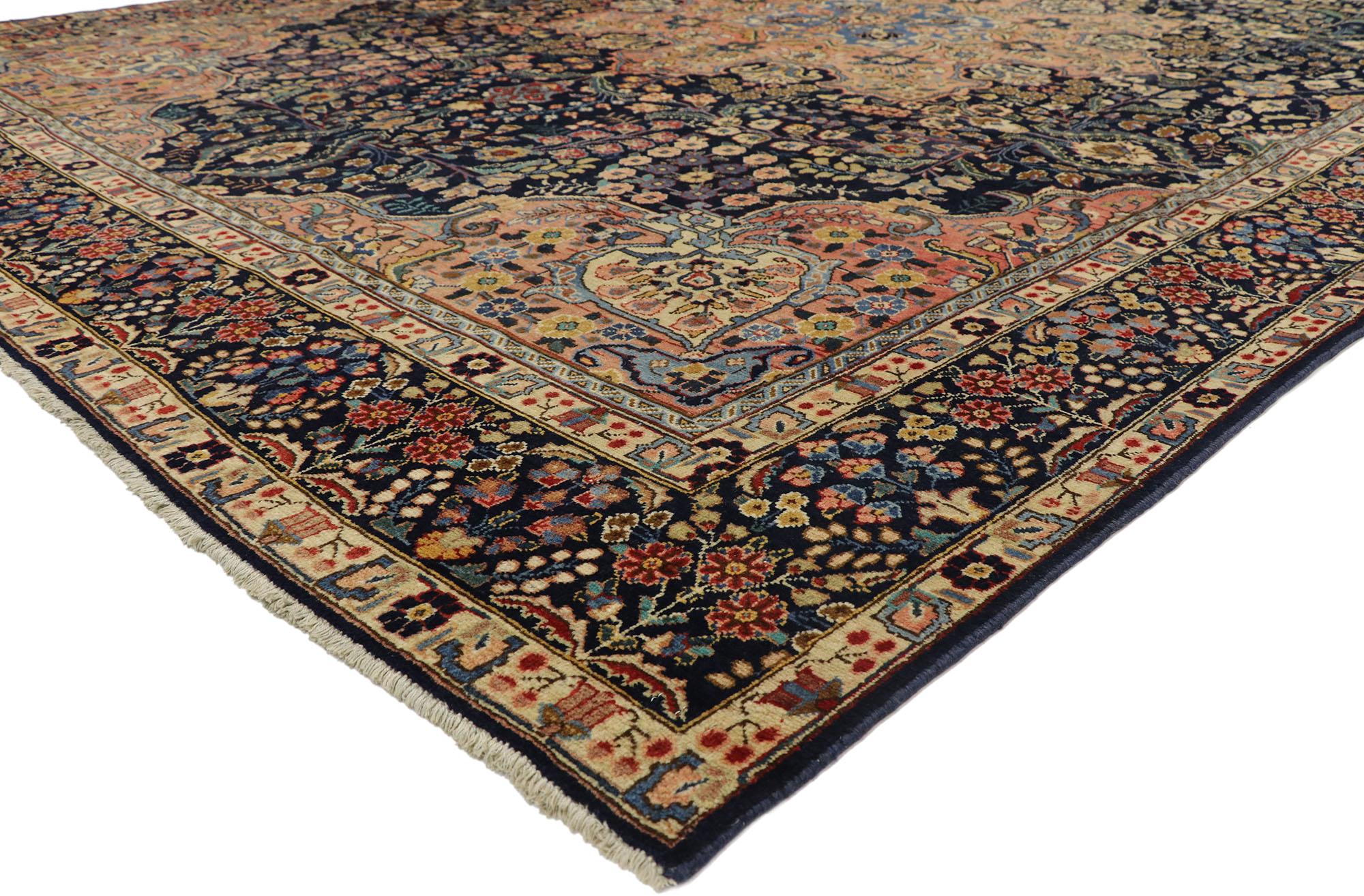 Resplendent with traditional style, this antique Tabriz rug handsomely communicates some of the finer points of eccentric Persian rug design. Featuring a grand border and an exquisite all-over floral pattern rendered in a stunning selection of