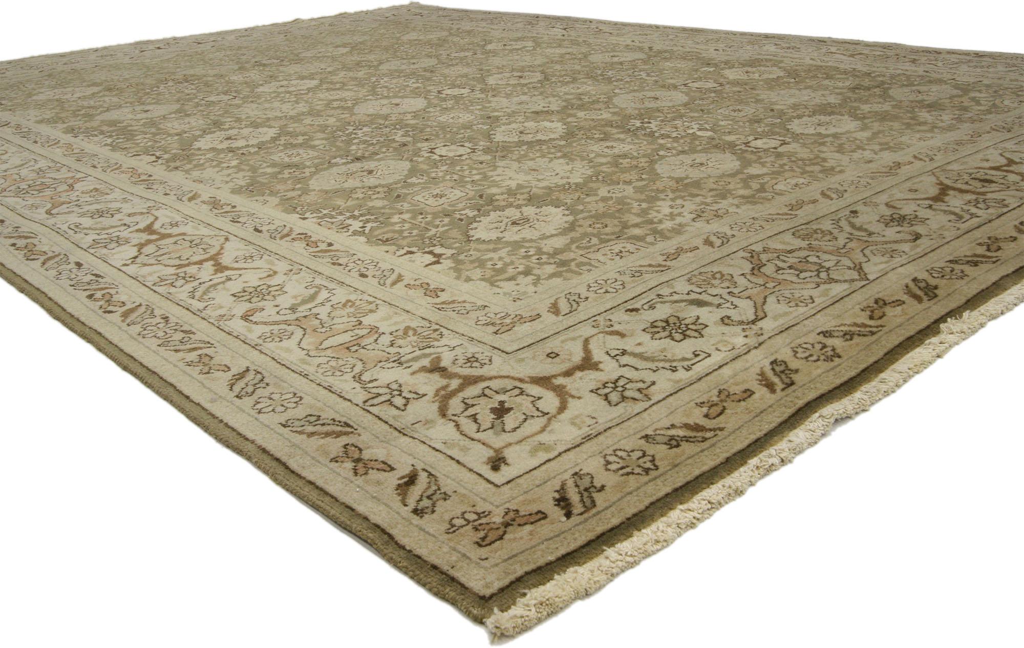 71779 Antique Persian Tabriz Rug, 08'04 x 11'00. This hand-knotted wool antique Persian Tabriz rug is an embodiment of laid-back luxury and intricate artistry, woven into every fiber. The antique-washed Persian Tabriz rug features a soft, earth-tone