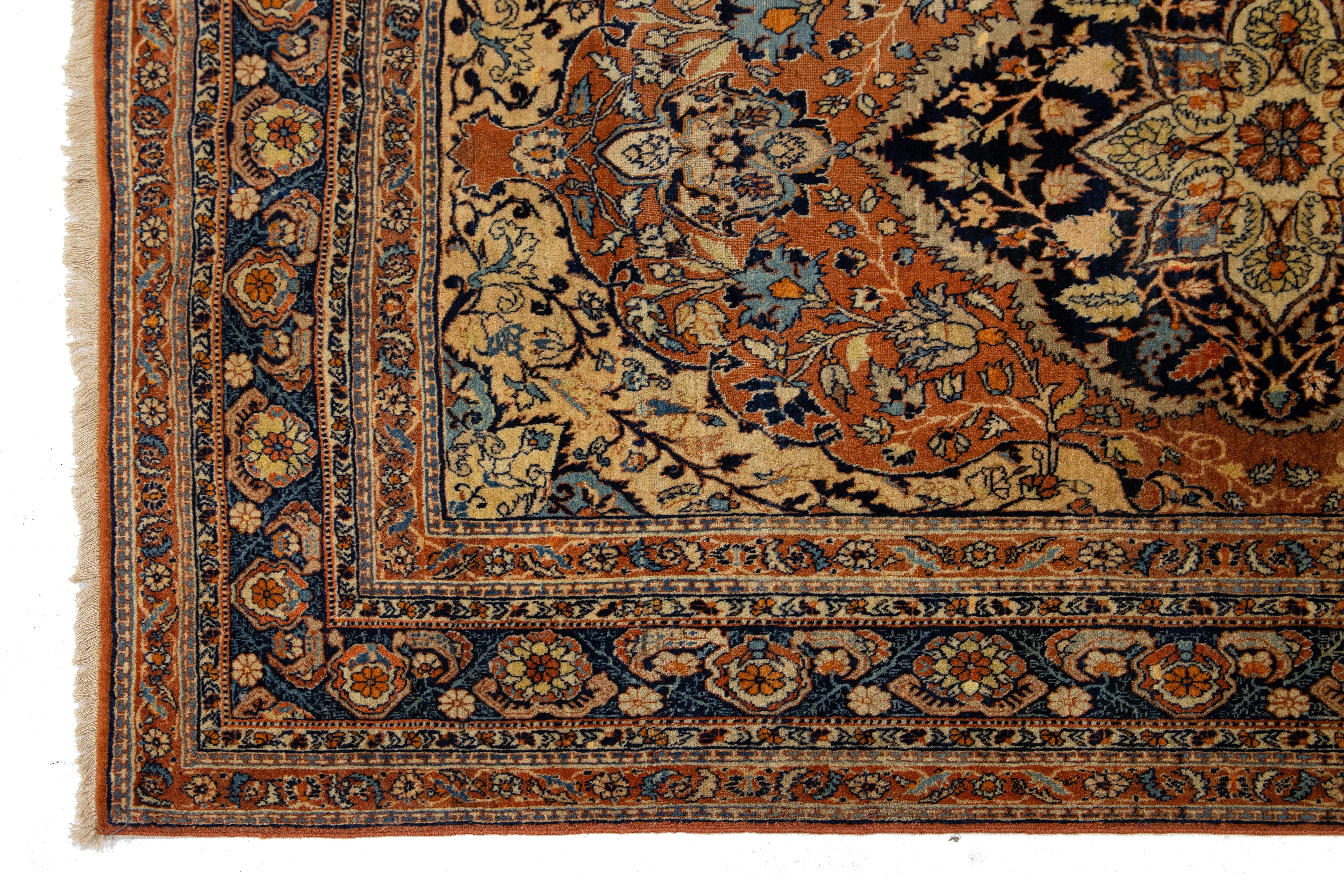 20ième siècle Tapis persan antique en laine Tabriz Rust avec design classique en médaillon en vente