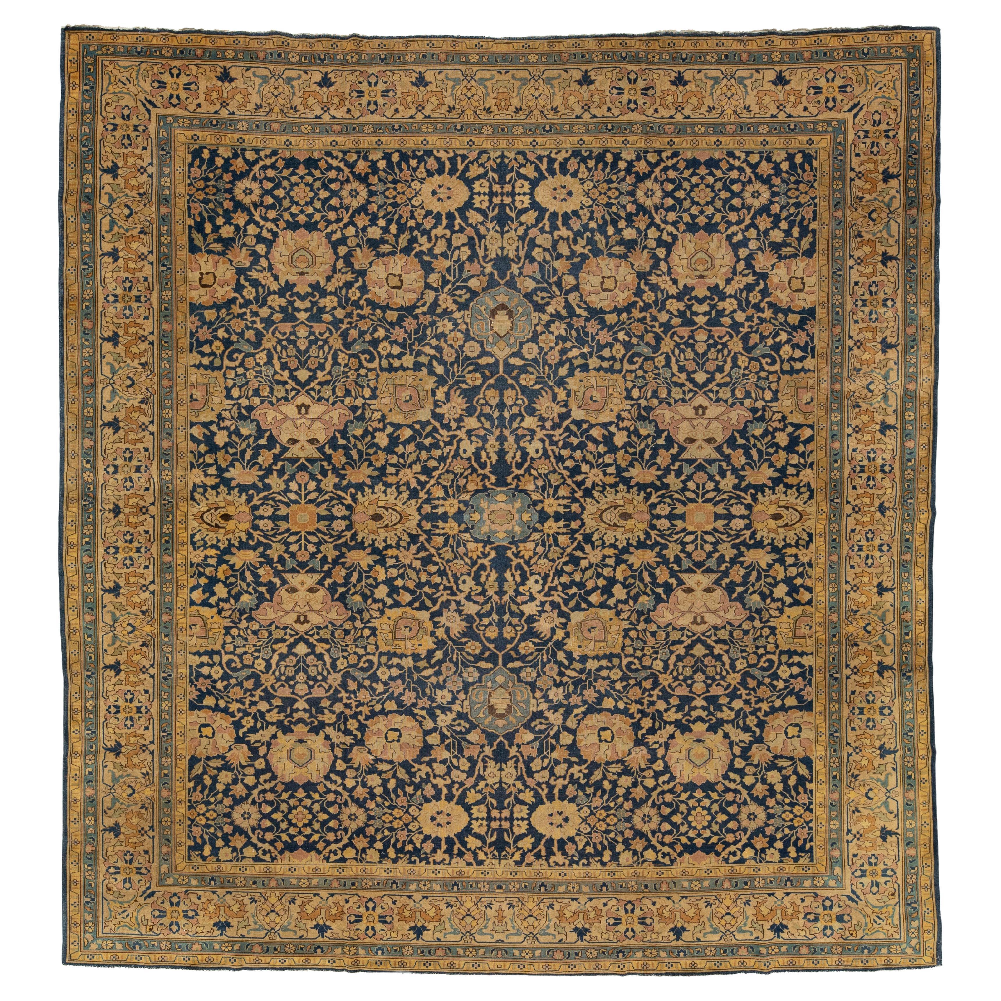 Antico tappeto persiano Tabriz quadrato in lana blu con disegno floreale all'interno
