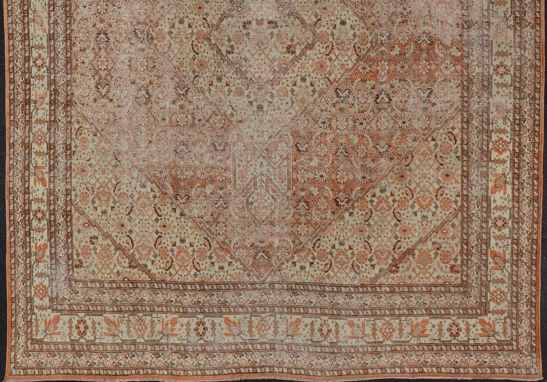 Antique Persian Tabriz with All-Over Medallion Design in Orange and Browns In Good Condition For Sale In Atlanta, GA