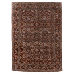 Antiker persischer Tabriz mit floralem Medaillon-Design in satten Erdtönen