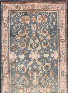 Antico Tabriz persiano con sfondo verde acqua e bordo rosa chiaro