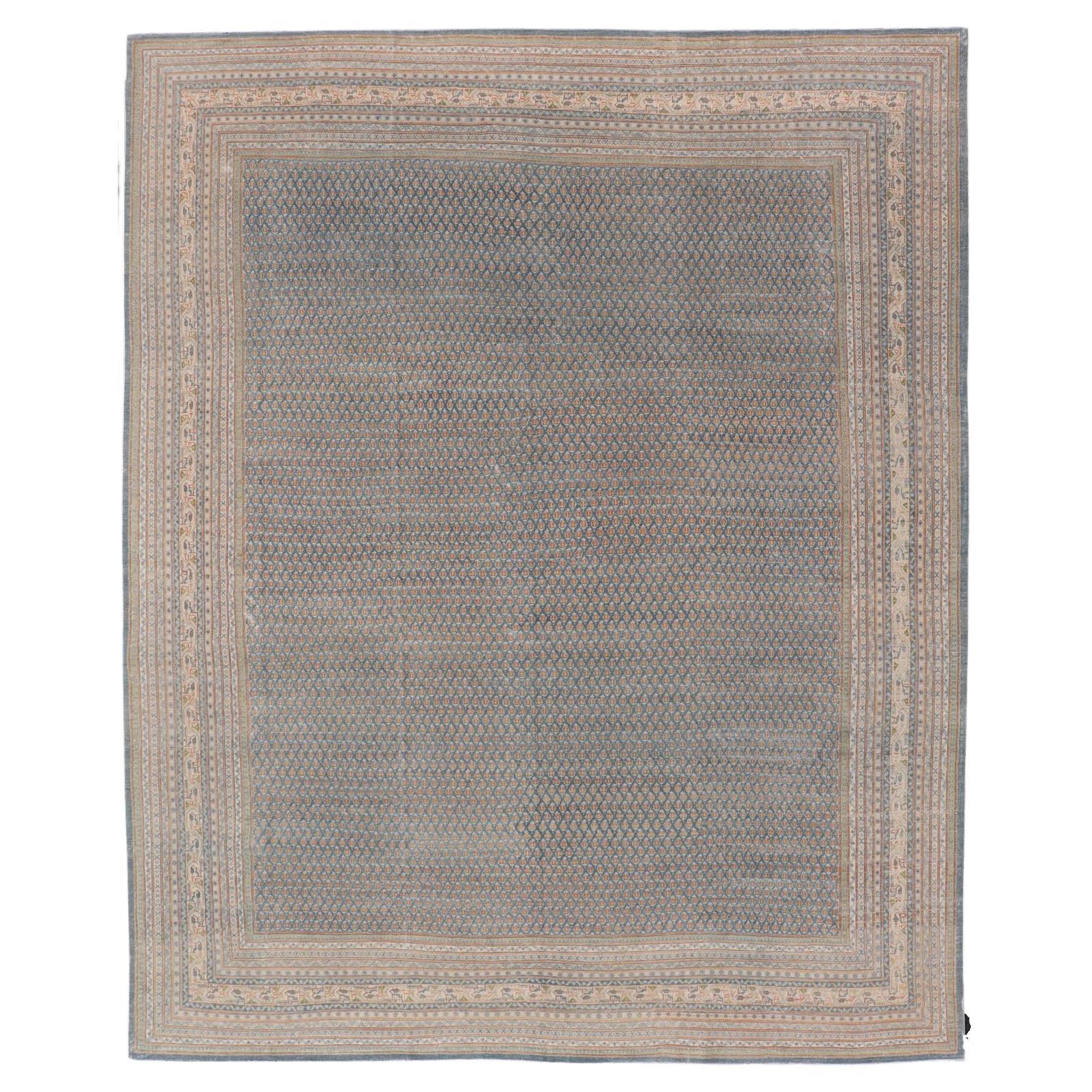 Antico Tabriz persiano con disegno Herati in scala ridotta in blu tenue 11
0 X 14
7