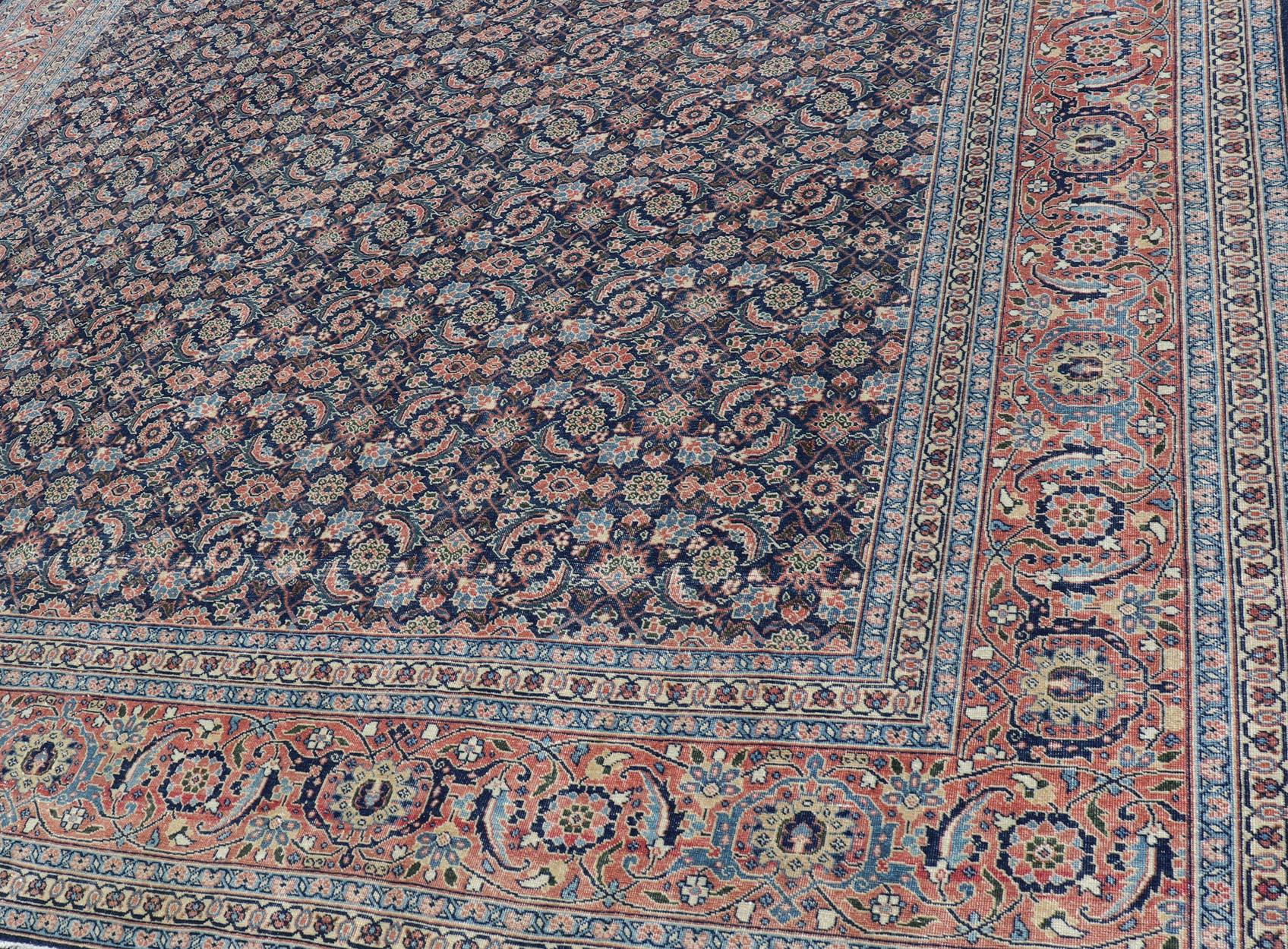 Wool Antique Persian Tabriz with Sub-Geometric Herati Design in Blue Background For Sale