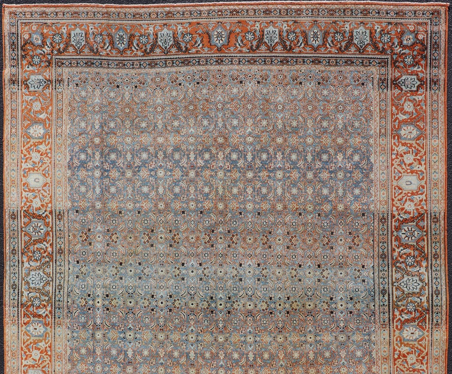 20th Century Antique Persian Tabriz with Sub-Geometric Herati Design in Orange and Blue For Sale