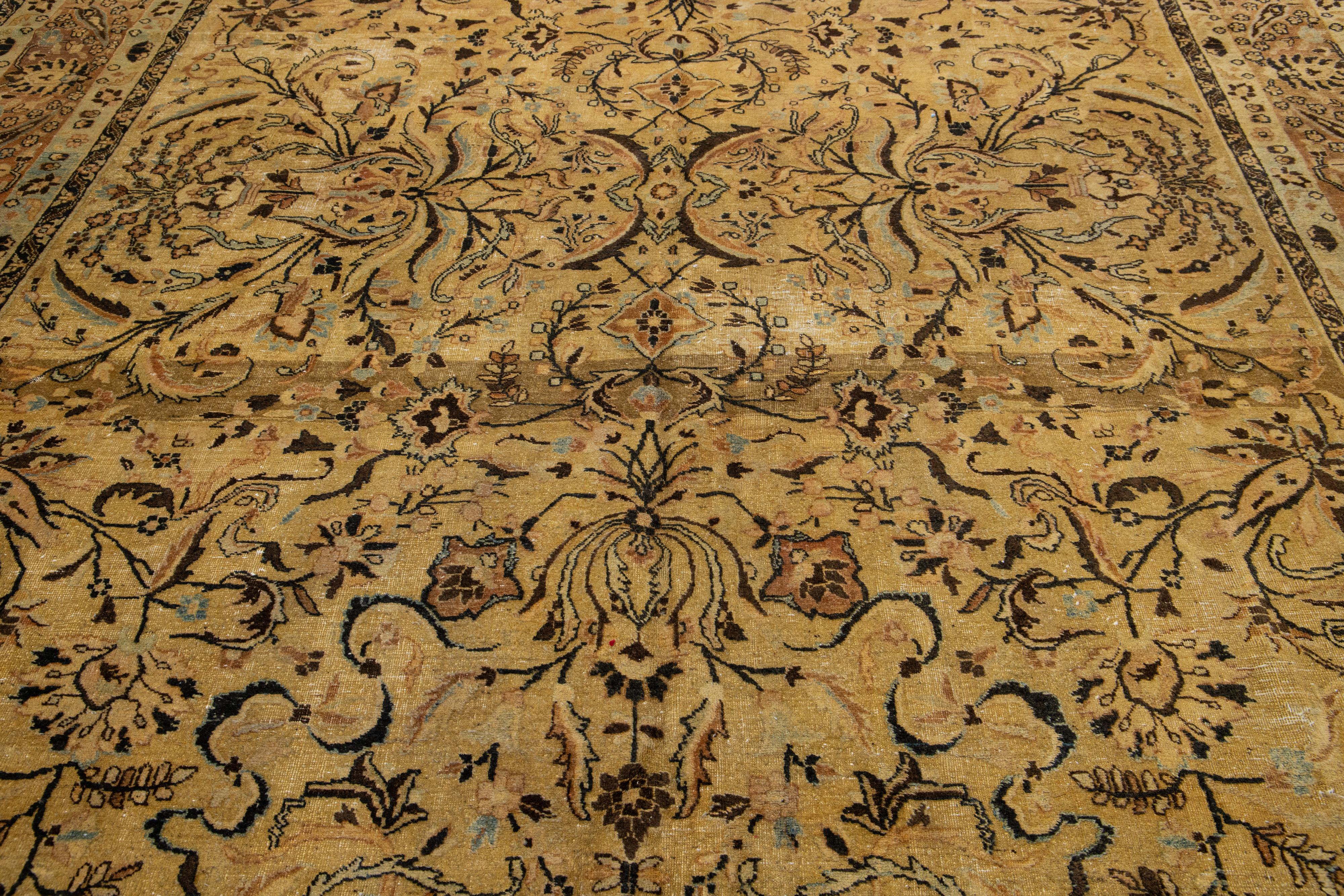 20th Century Antique Persian Tabriz Wool Rug With Allover Floral In Golden Color For Sale