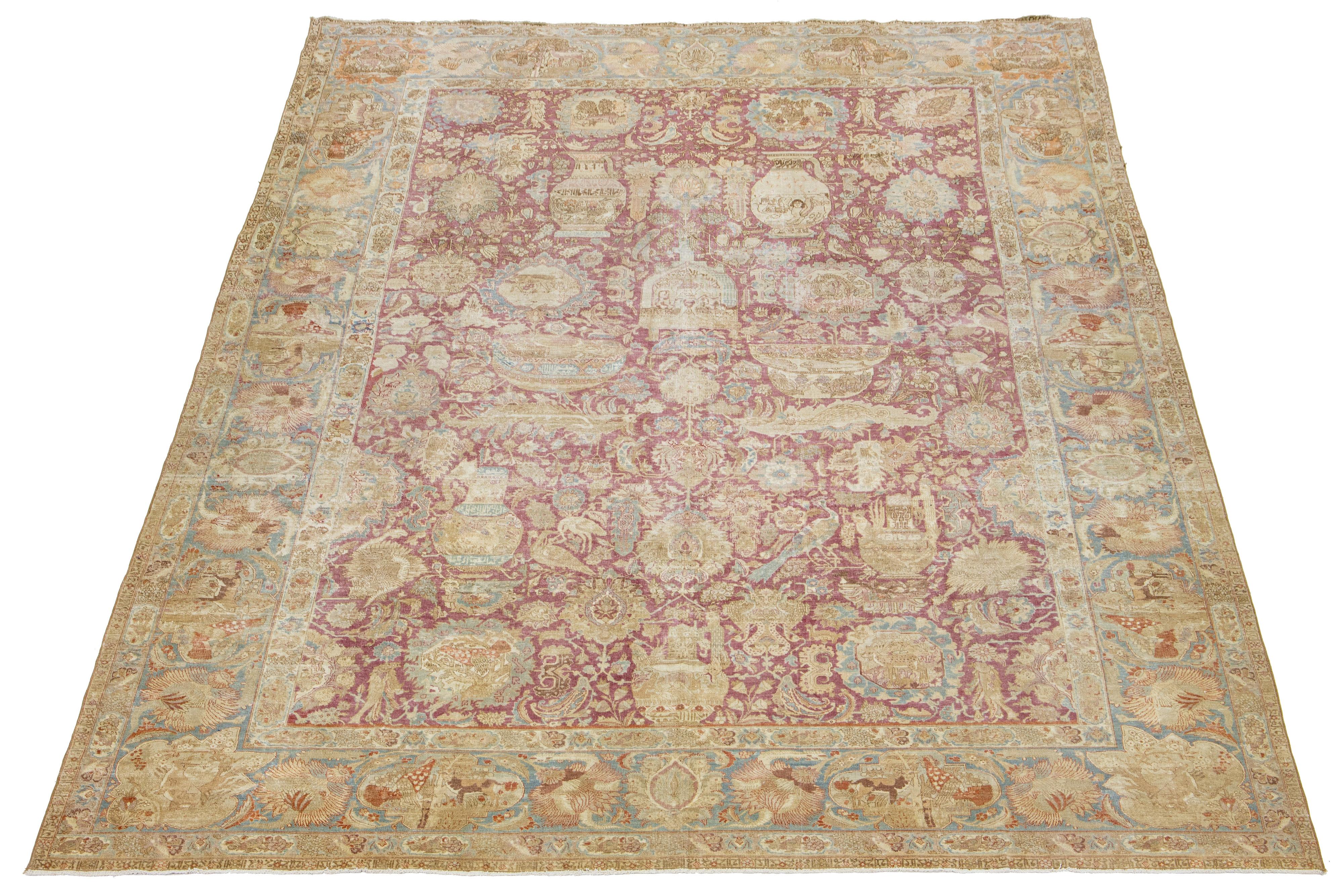 The Persian Tabriz wool rug is handcrafted and showcases a beautiful traditional floral pattern. The alluring contrast between the red raspberry background and the intricate beige, blue, and brown floral design further enhances its beauty.

This rug