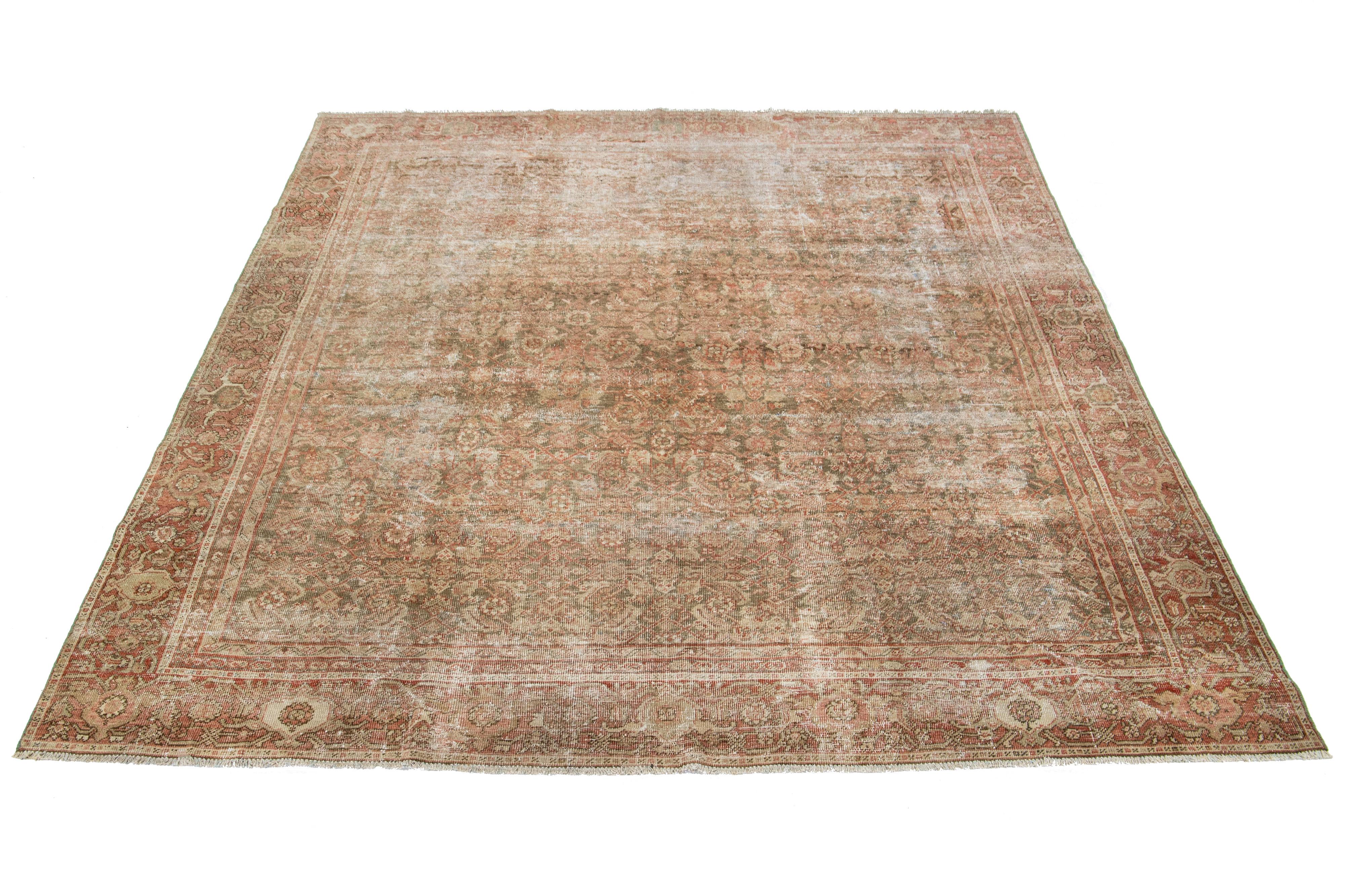 Handcrafted, this Persian Tabriz wool rug beautifully displays a traditional floral pattern. The stunning contrast between the brown backdrop and the intricate rust floral design adds to its allure.

This rug measures 8' x 9'5'.

Our Rugs are