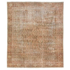 Tapis persan ancien de Tabriz en laine avec motif sur toute sa surface de rouille des années 1910