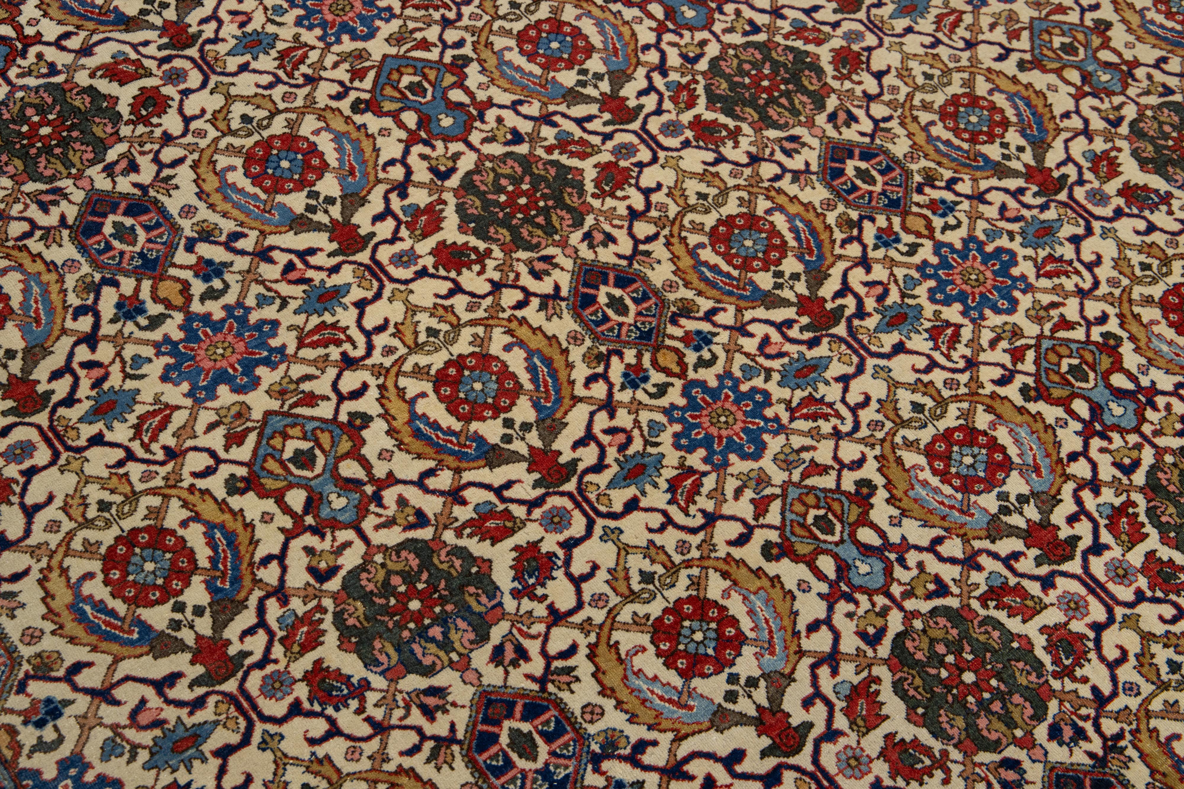 Antiker persischer Teheraner handgefertigter Wollteppich mit mehrfarbigem Allover-Muster im Angebot 1