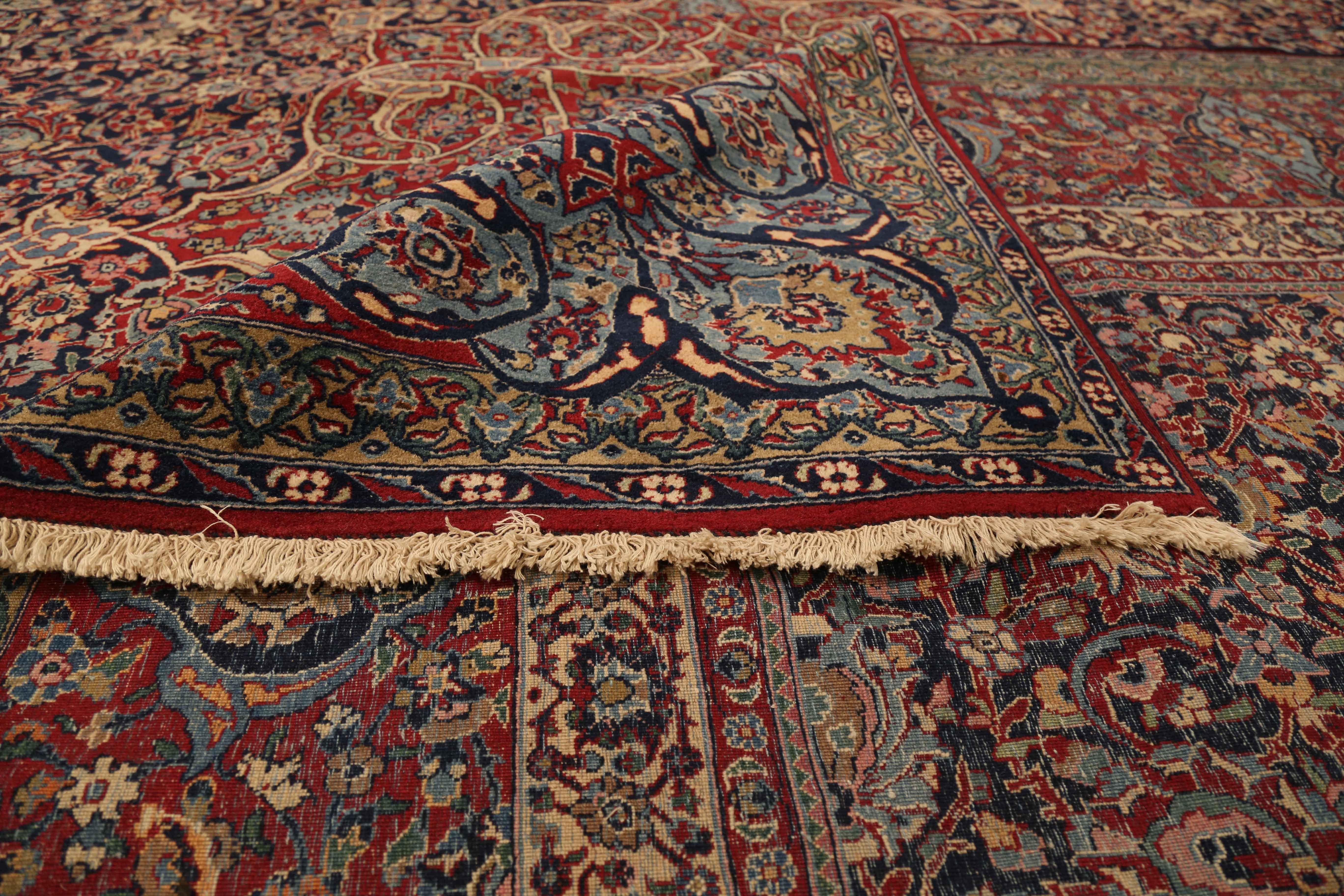 Antique Persian rug handmade in the 1960s era. Weavers used Fine and exquisite wool colored with rich all-organic vegetable dyes. It exhibits a grand design of highly intricate details woven together to form a stunning medallion at the centre