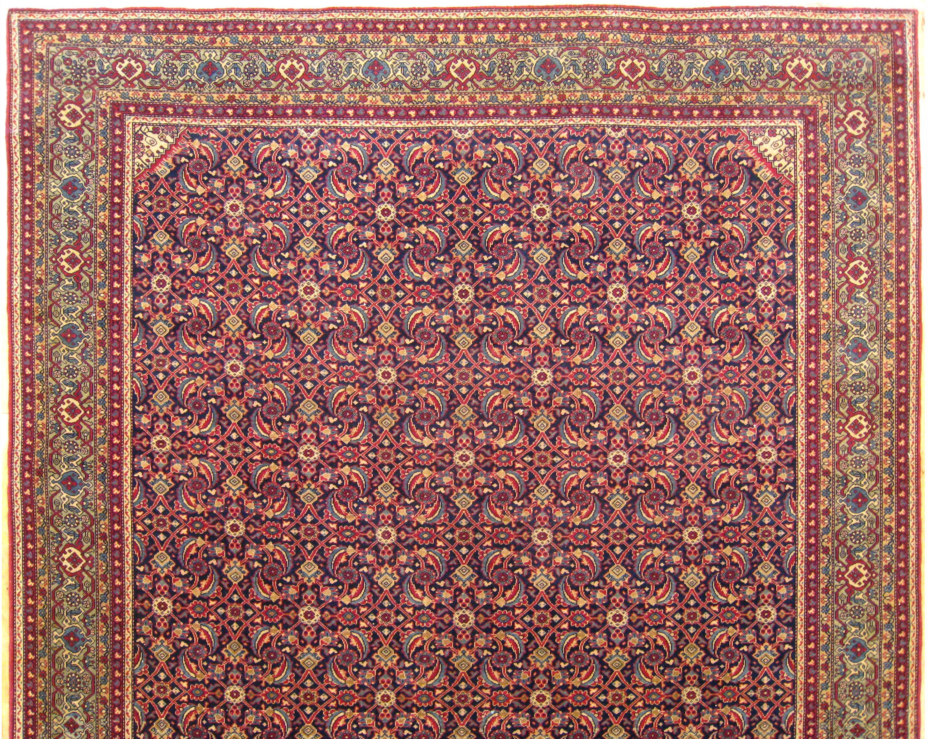 Antique Persian Tehran Small Carpet with Repeating Herati Design on a Navy Field In Good Condition For Sale In New York, NY
