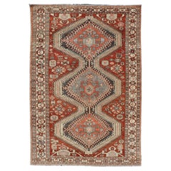 Ancien tapis persan tribal Bakhtiari au design géométrique