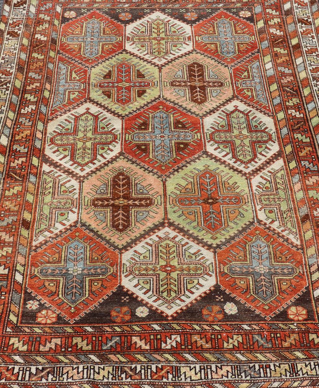 Hand-Knotted Antique Persian Tribal Motif Design with Crosses Bakhtiari Rug in Multi Colors For Sale