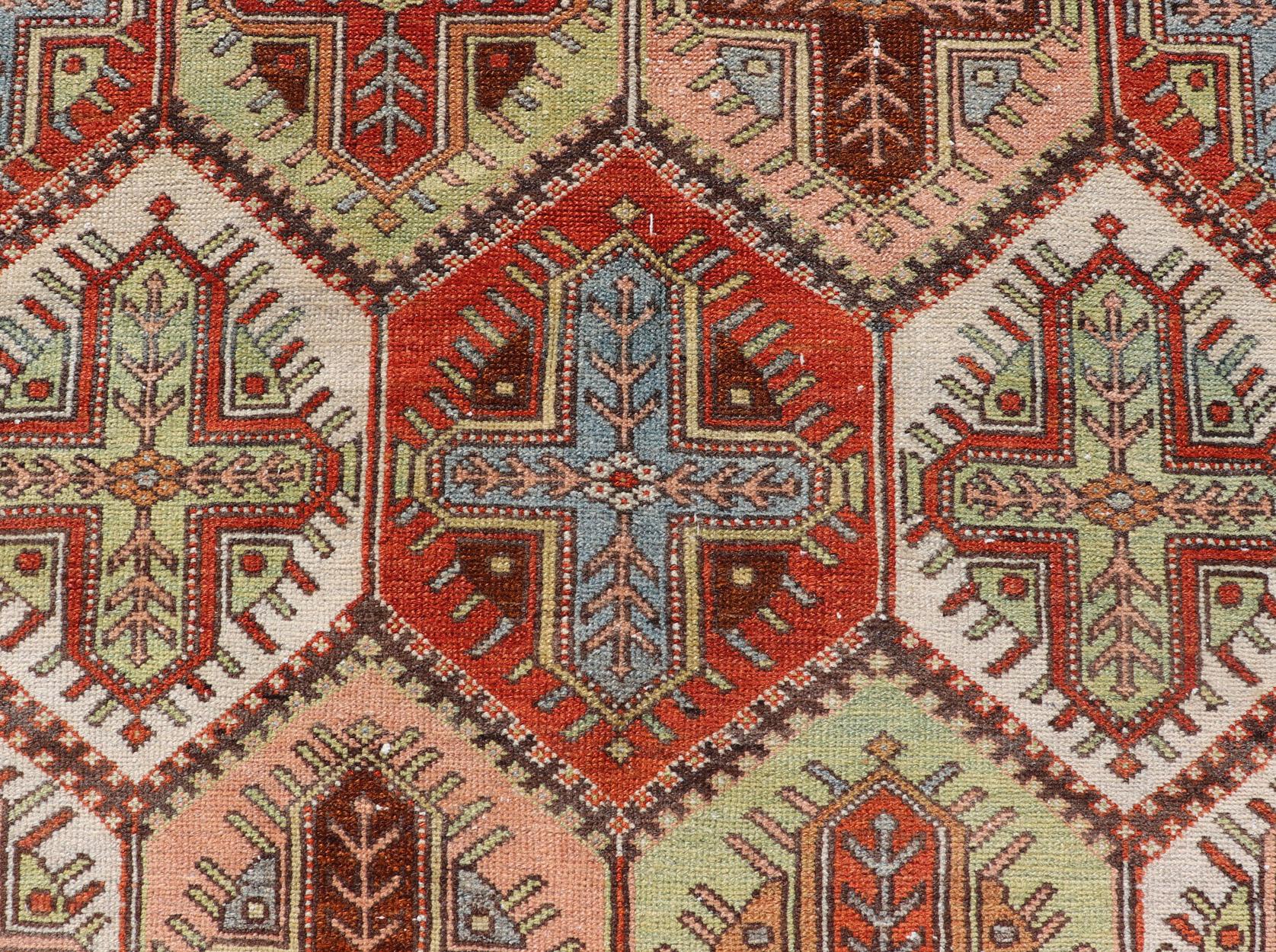 20th Century Antique Persian Tribal Motif Design with Crosses Bakhtiari Rug in Multi Colors For Sale