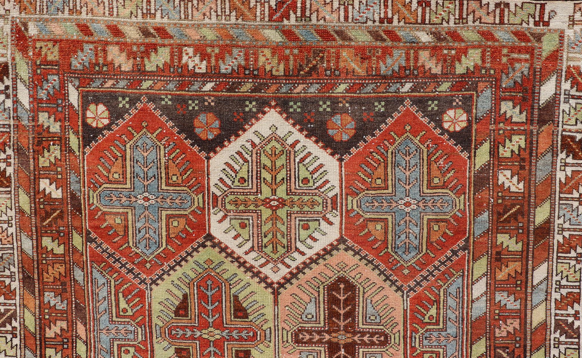Wool Antique Persian Tribal Motif Design with Crosses Bakhtiari Rug in Multi Colors For Sale