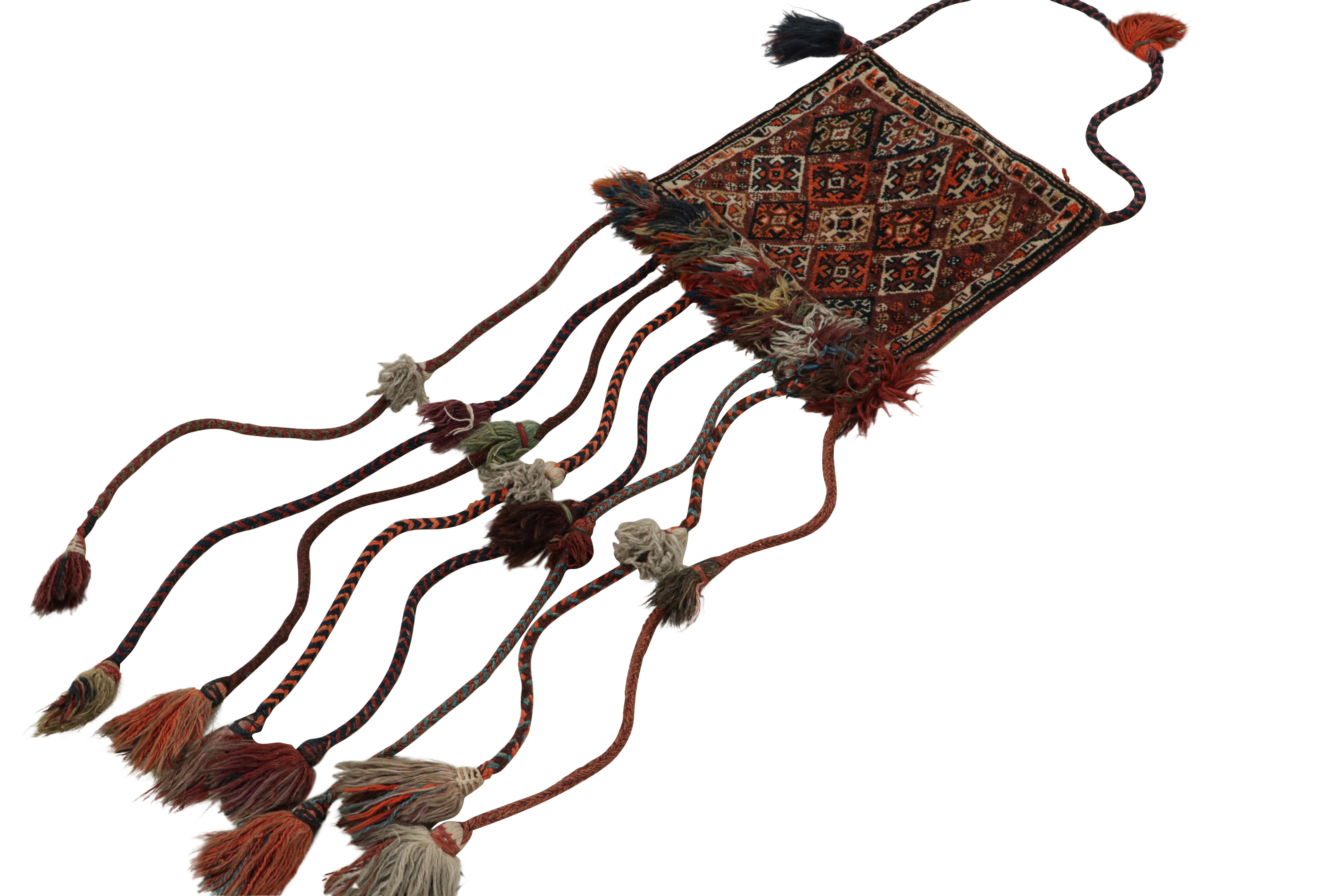 Handwoven in wool circa 1910-1920, this item is a rare antique Persian tribal salt bag, once used to store salt for cooking and for migration purposes by nomadic tribes.

On the Design:

The center of the piece is a hand-knotted 1x1 square, with
