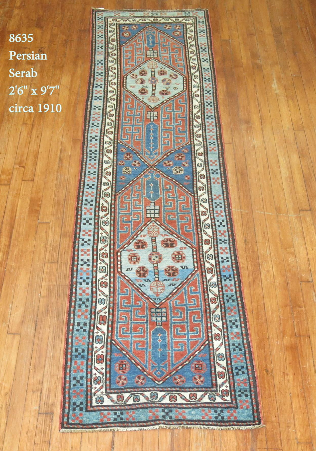 An early 20th century tribal one of a kind decorative Persian Serab runner.