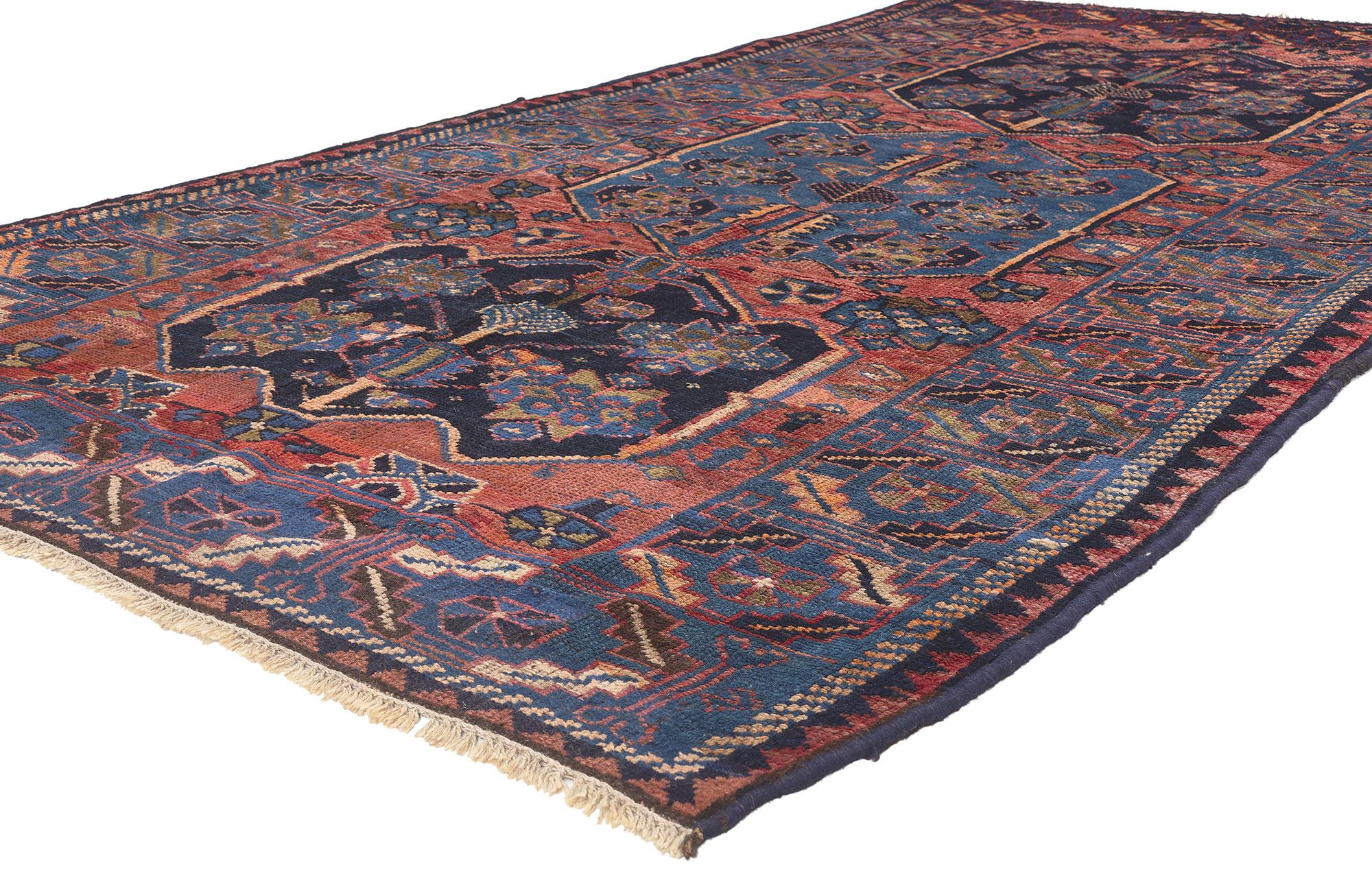 61243 Antique Persian Shiraz Rug, 04'09 x 08'11.
Emanating Qashqai Tribe influence with incredible detail and texture, this hand knotted wool antique Persian Shiraz rug is a captivating vision of woven beauty. The intricate tribal design and