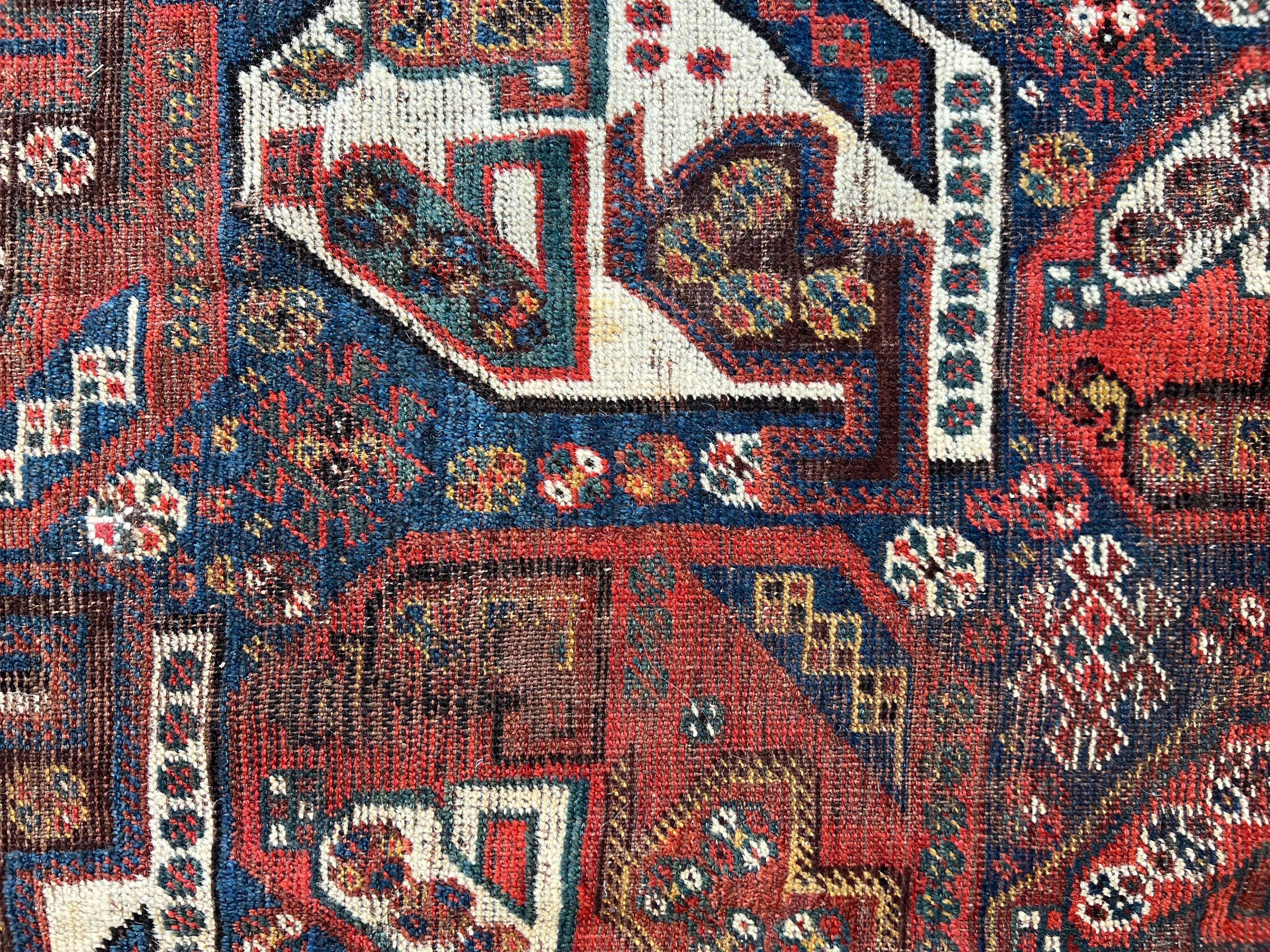 Antique Persian Tribal Shiraz Rug with a Repeating All over Pattern In Good Condition For Sale In Birmingham, AL