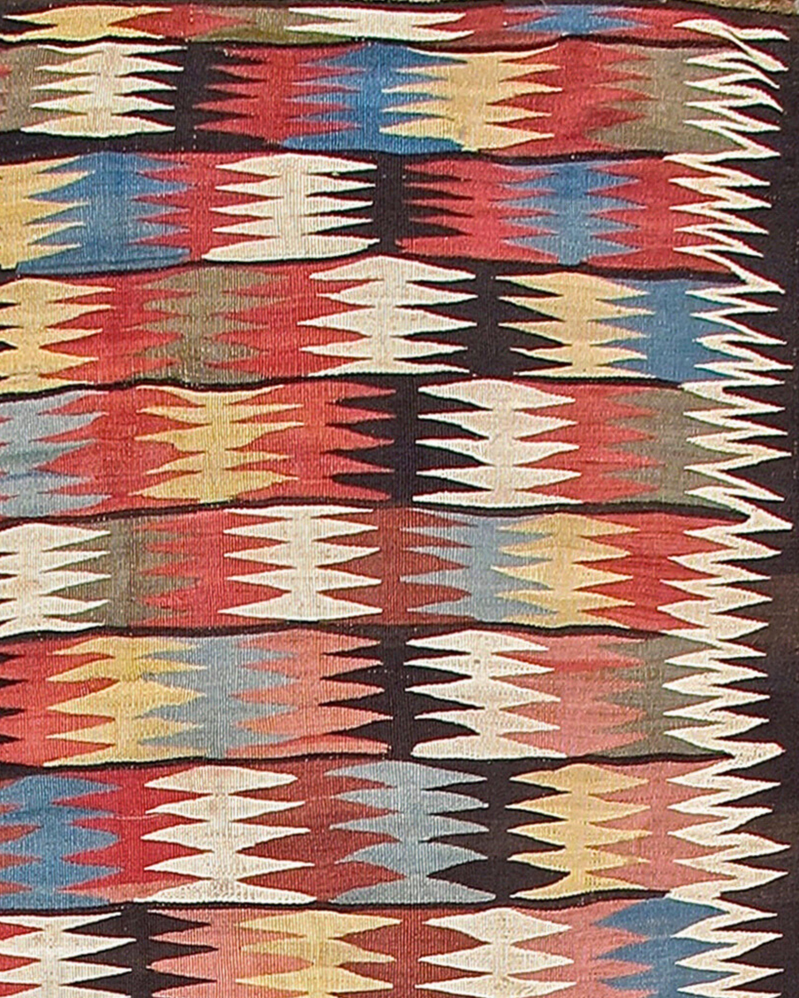 Antique Persian Veramin Kilim Rug, c. 1900

This kilim has a macrame end finish at one end and camel warps alternating with brown and white ply warps on the other. Very good color.

Additional Information:
Dimensions: 10'0