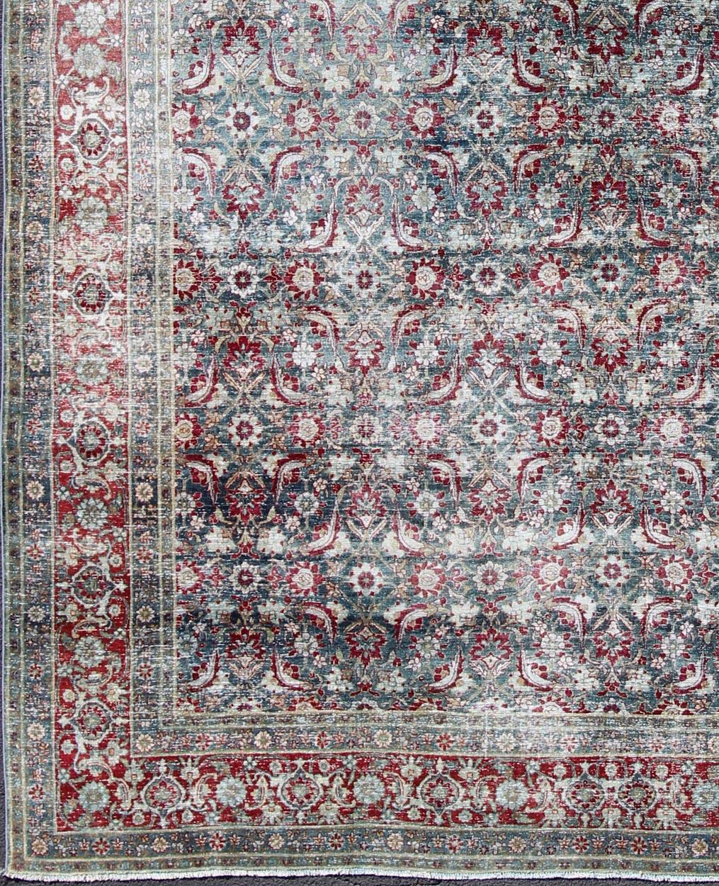 Persian antique Yazd carpet in blue and red tones with diamond geometric floral design, rug ema-7575, country of origin / type: Iran / Tabriz, circa 1910

This antique Persian Yazd carpet (circa 1910) features a refined palate of various shades of
