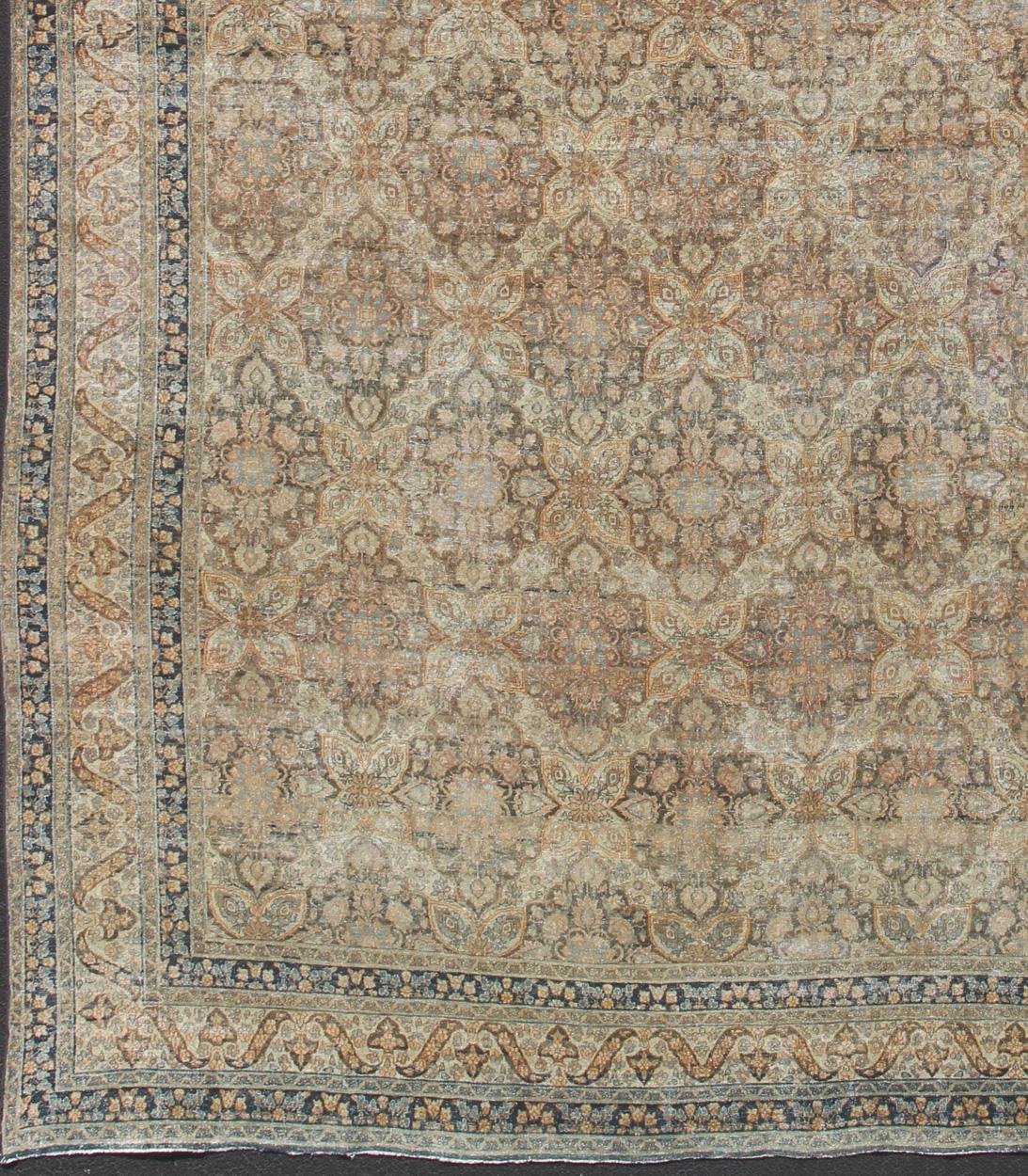 Antique Persian Yzad rug with all-over pattern from Persia with Elegant Medallion floral geometric design, rug 19-0607, country of origin / type: Iran / Yzad, circa 1910.

This antique Persian Yzad carpet (circa early 20th century) features a