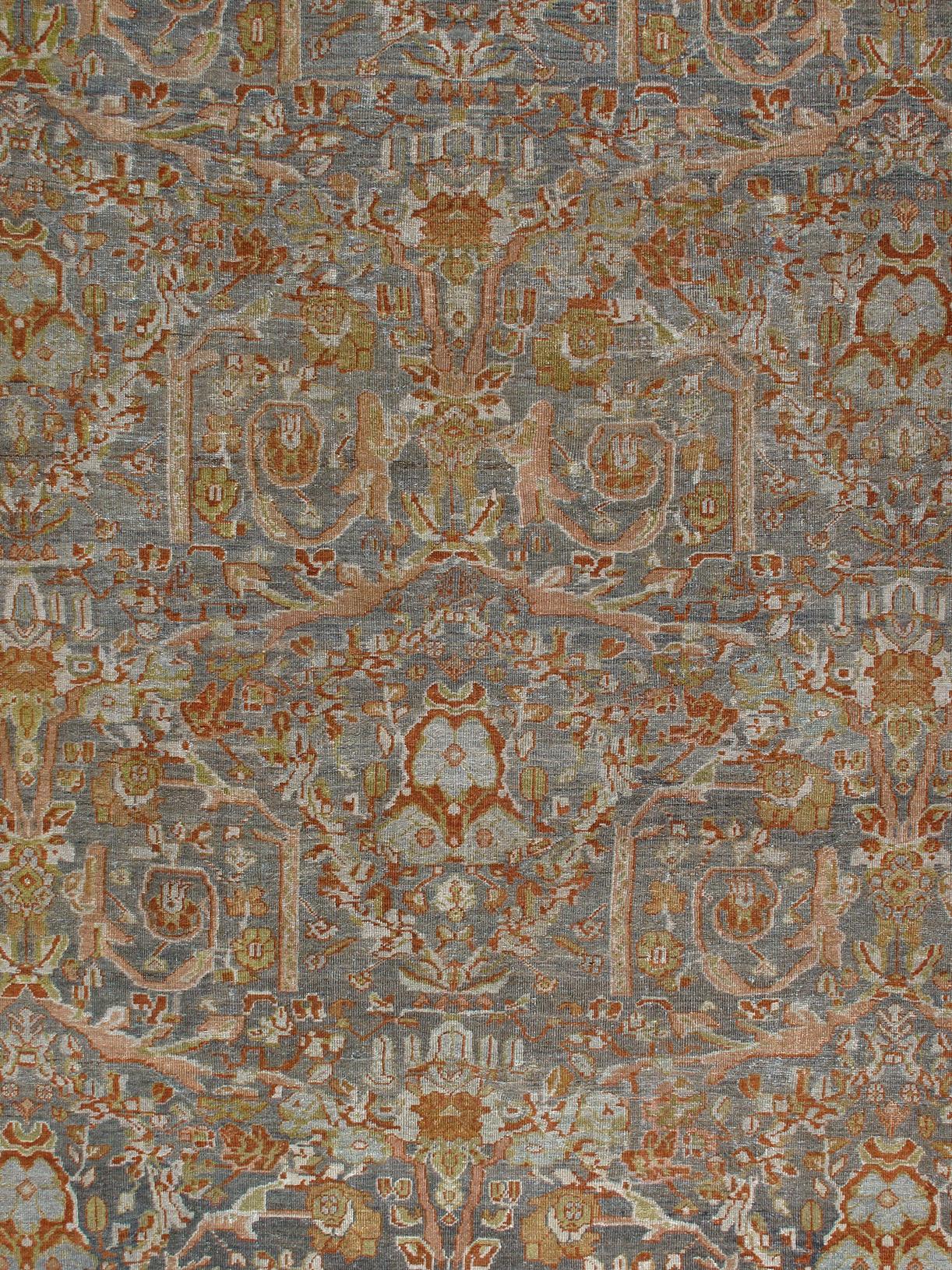 Absolutely breathtaking Antique Ziegler Sultanabad rug from the early 20th century in impeccable condition. This is a true statement piece that will transform any space. Beautiful blue background color with rust accents, made from 100% handspun and