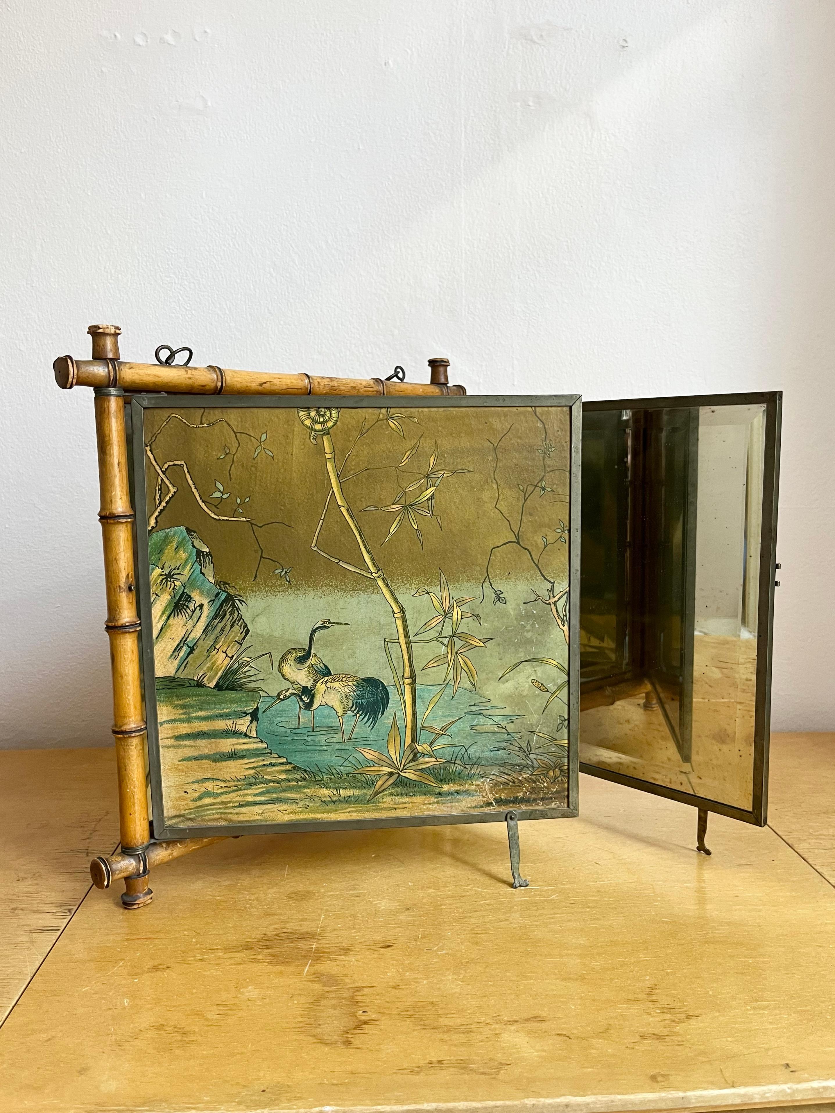 American Antique Peter Wiederer & Brothers tri-fold shaving mirror with decorative birds For Sale